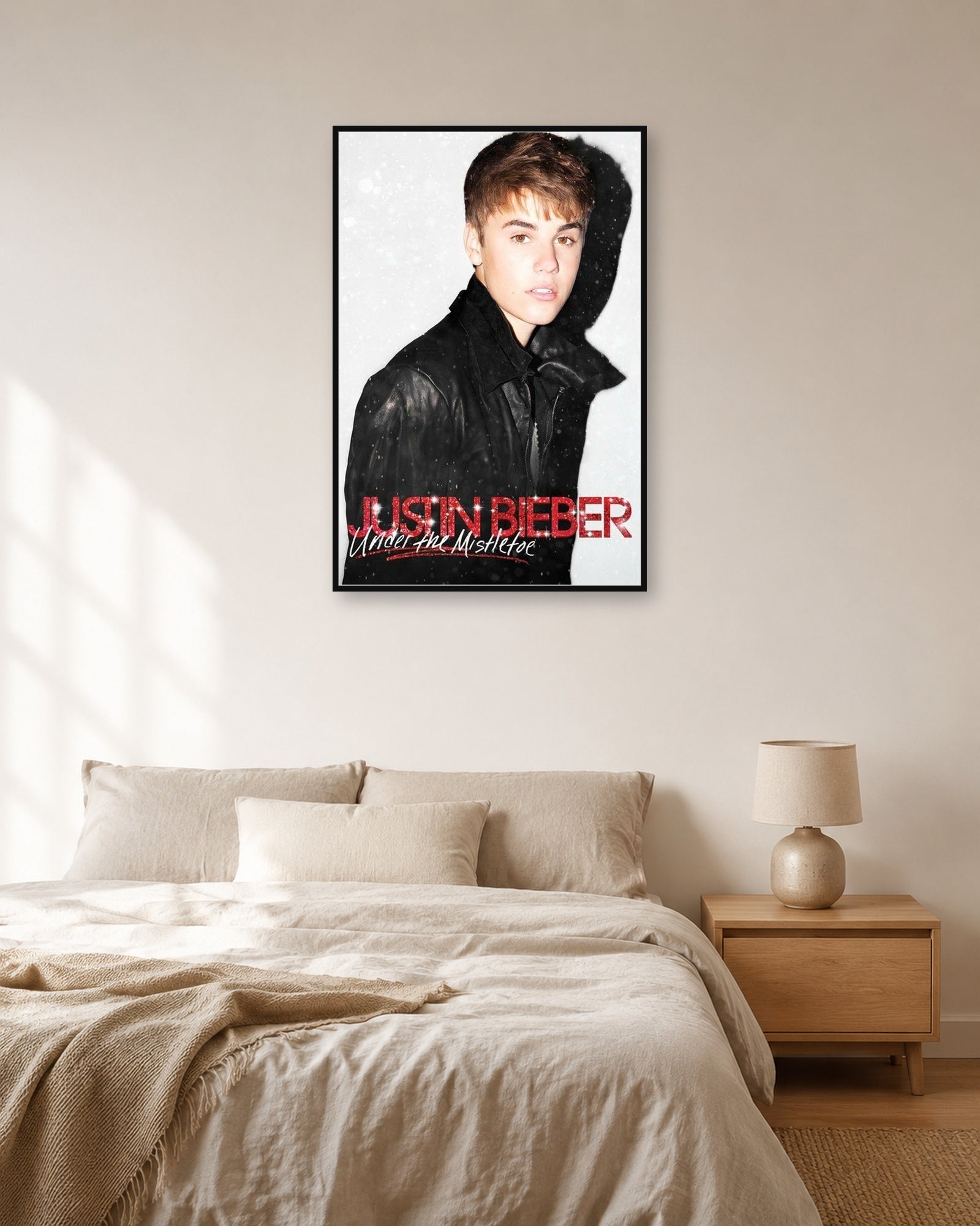 Justin Bieber Under the Mistletoe album poster in fixed off-white natural-light bedroom display scene
