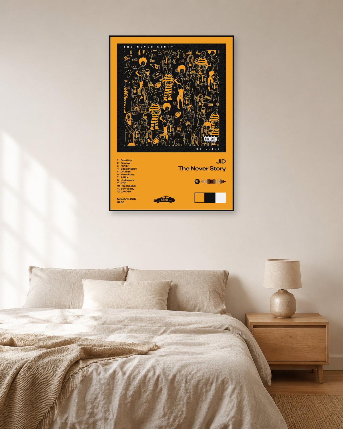JID The Never Story Orange Tracklist Poster — natural-light bedroom display. Print sold unframed; frame for display only.