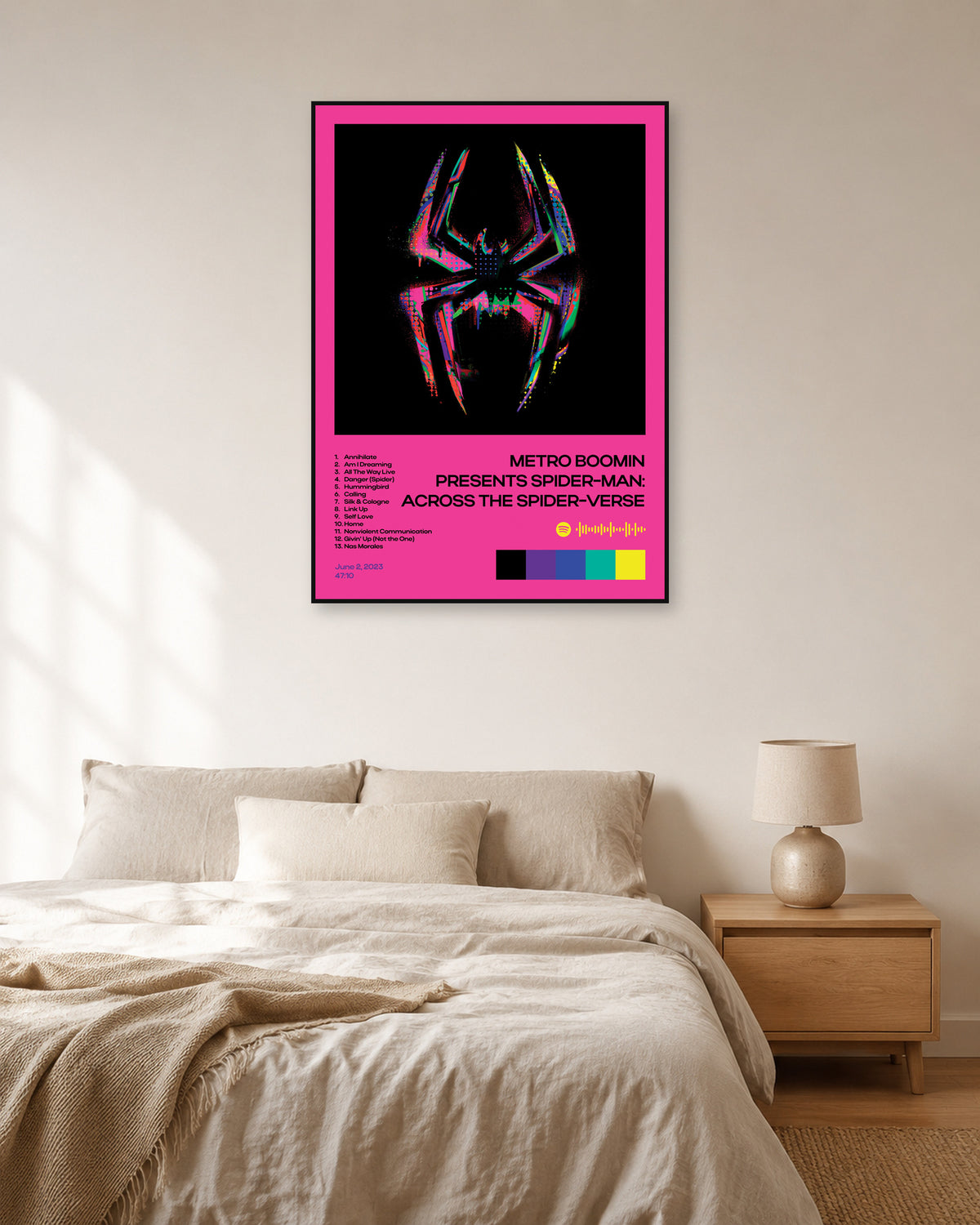 Metro Boomin Spider-Man: Across the Spider-Verse Pink Tracklist Poster — natural-light bedroom display. Print sold unframed; frame for display only.