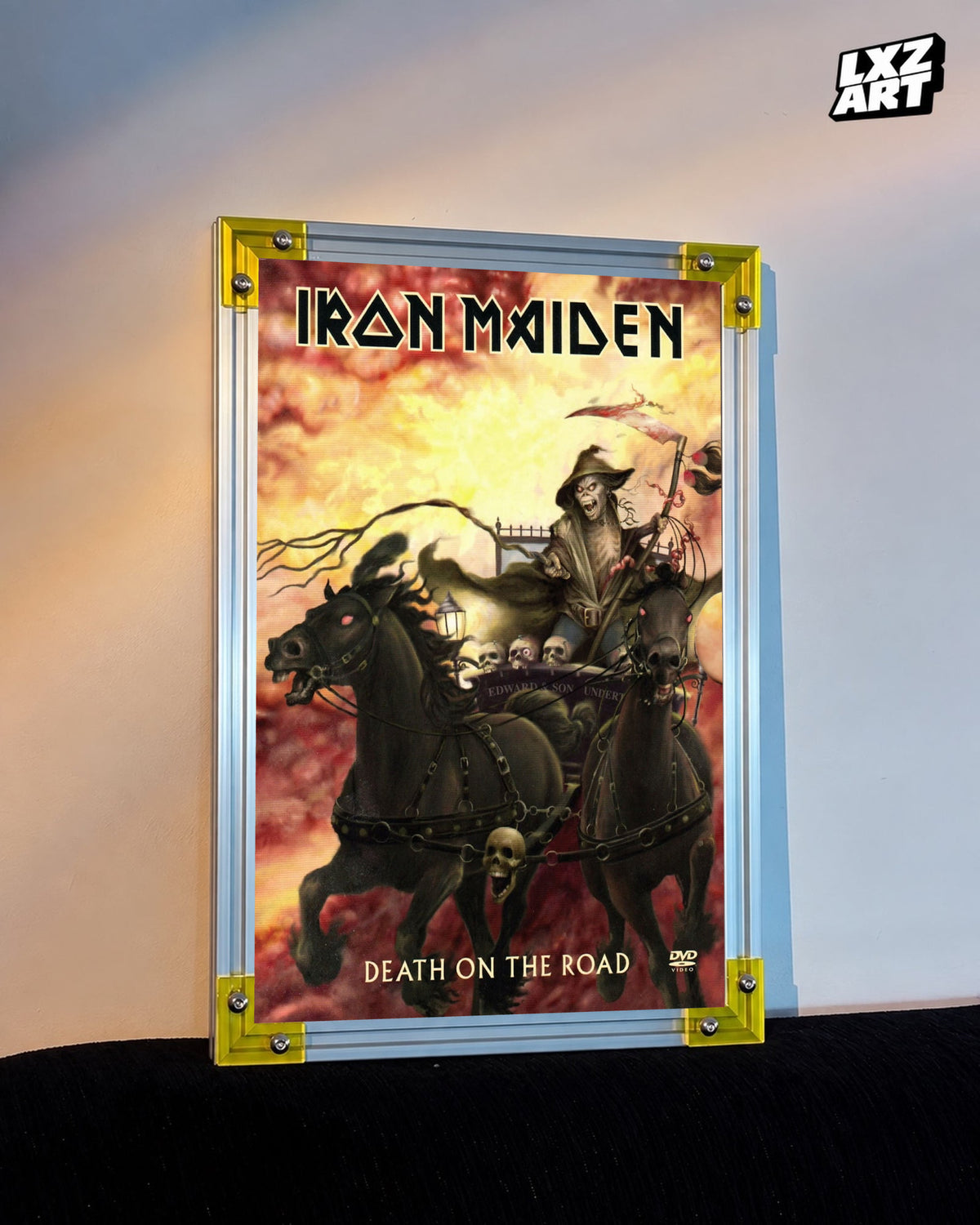 Iron Maiden Death on the Road Concert Film poster displayed against a warm wall in a yellow-corner frame; unframed print, frame not included