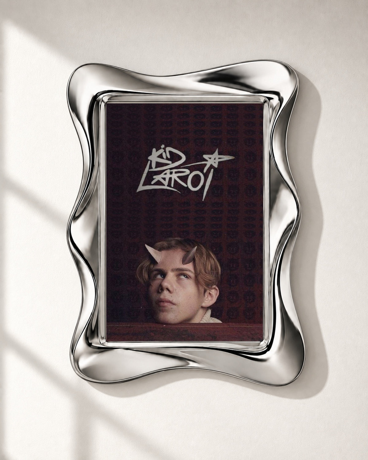 The Kid LAROI Burgundy Horned Portrait and Logo poster, close-up; frame not included