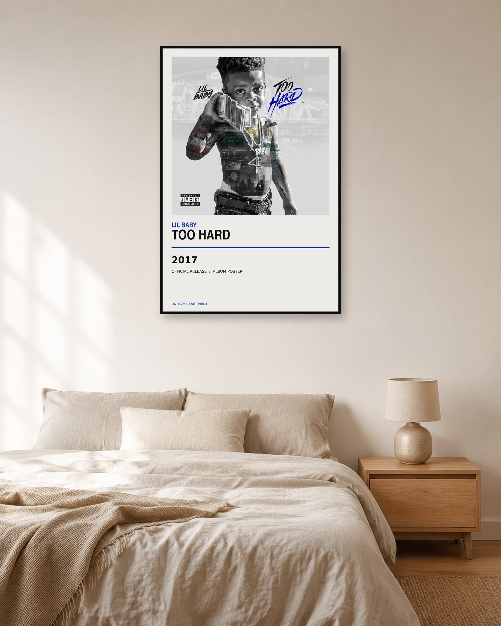 Lil Baby Too Hard album poster displayed in natural light bedroom