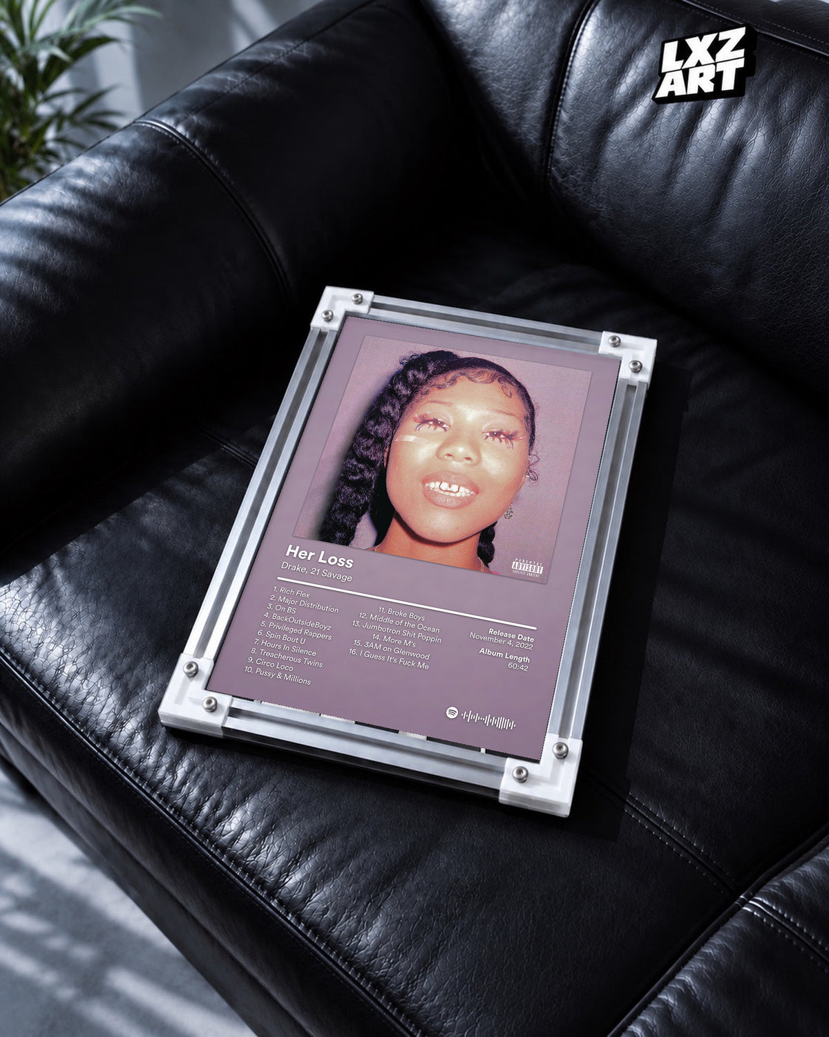 Drake & 21 Savage Her Loss Mauve Tracklist Poster | Unframed Wall Art displayed on a black leather sofa; frame not included.