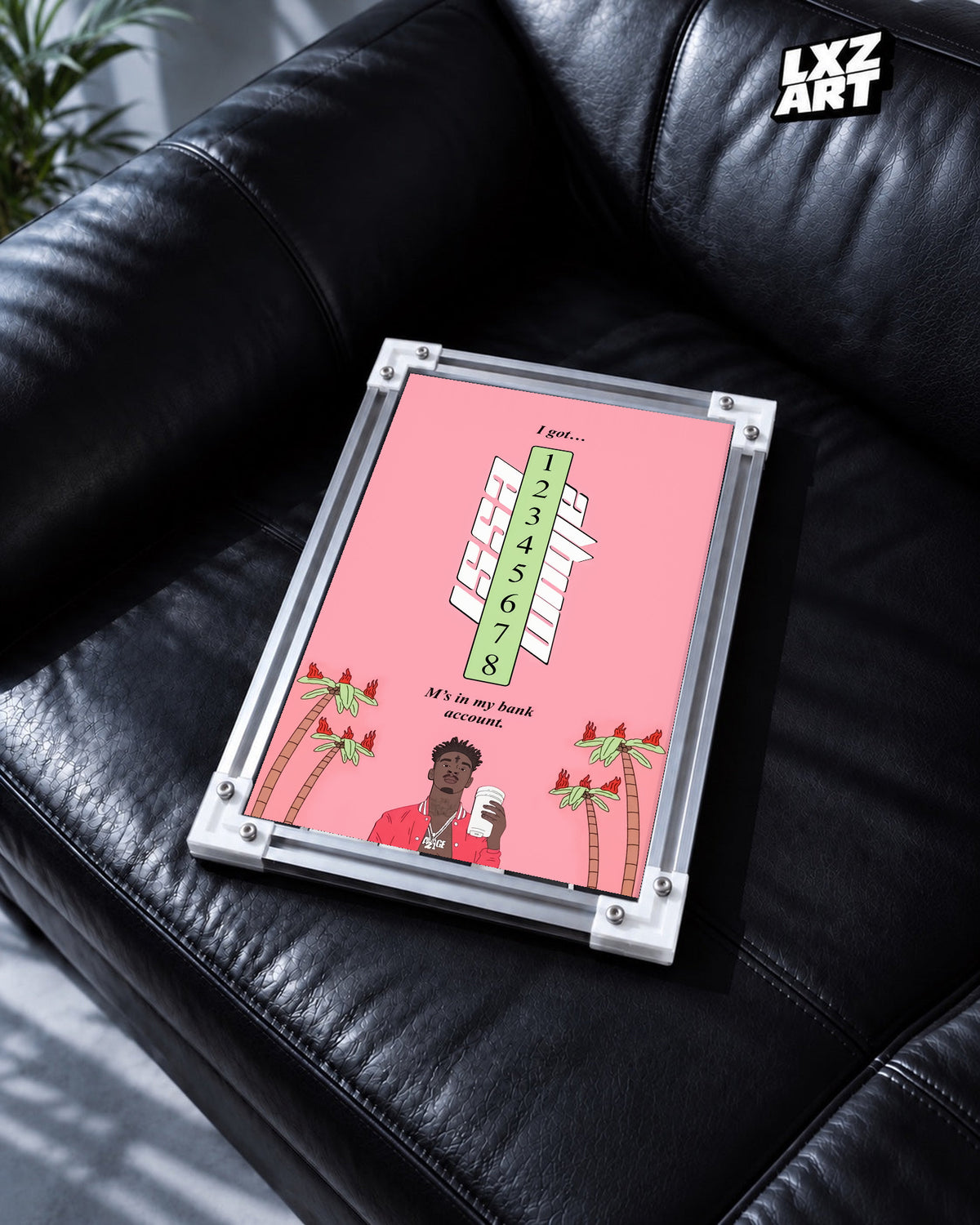 21 Savage Bank Account Pink Lyric Poster | Unframed Wall Art displayed on a black leather sofa; frame not included.