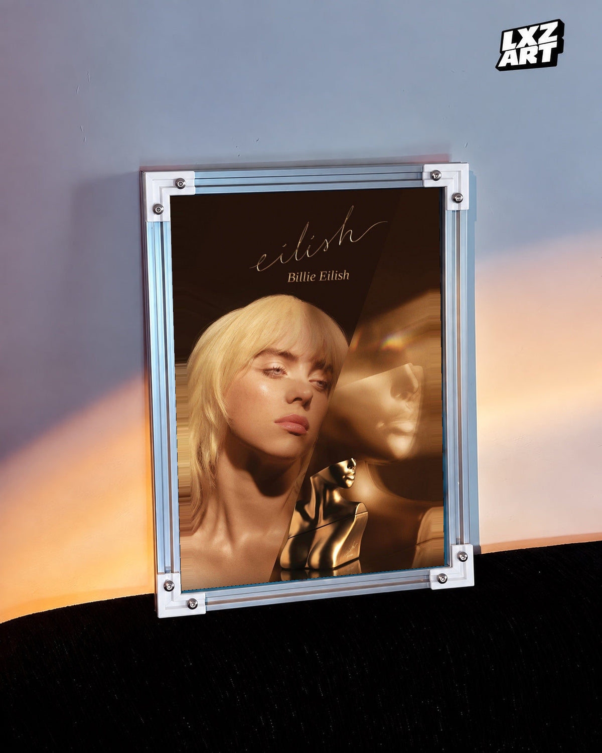 Billie Eilish Golden Portrait Poster in white-corner frame beside warm-lit wall. Frame shown for display only.