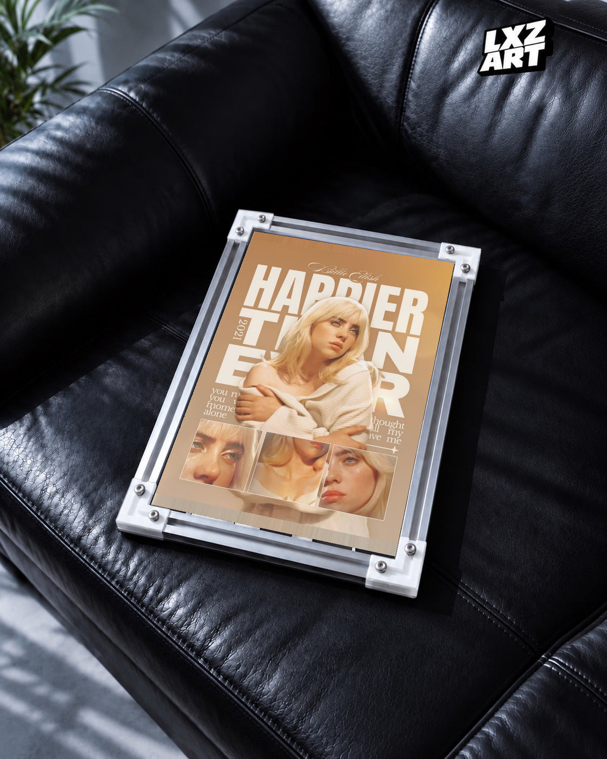 Billie Eilish Happier Than Ever Collage Poster in white-corner frame on black leather sofa. Frame shown for display only.