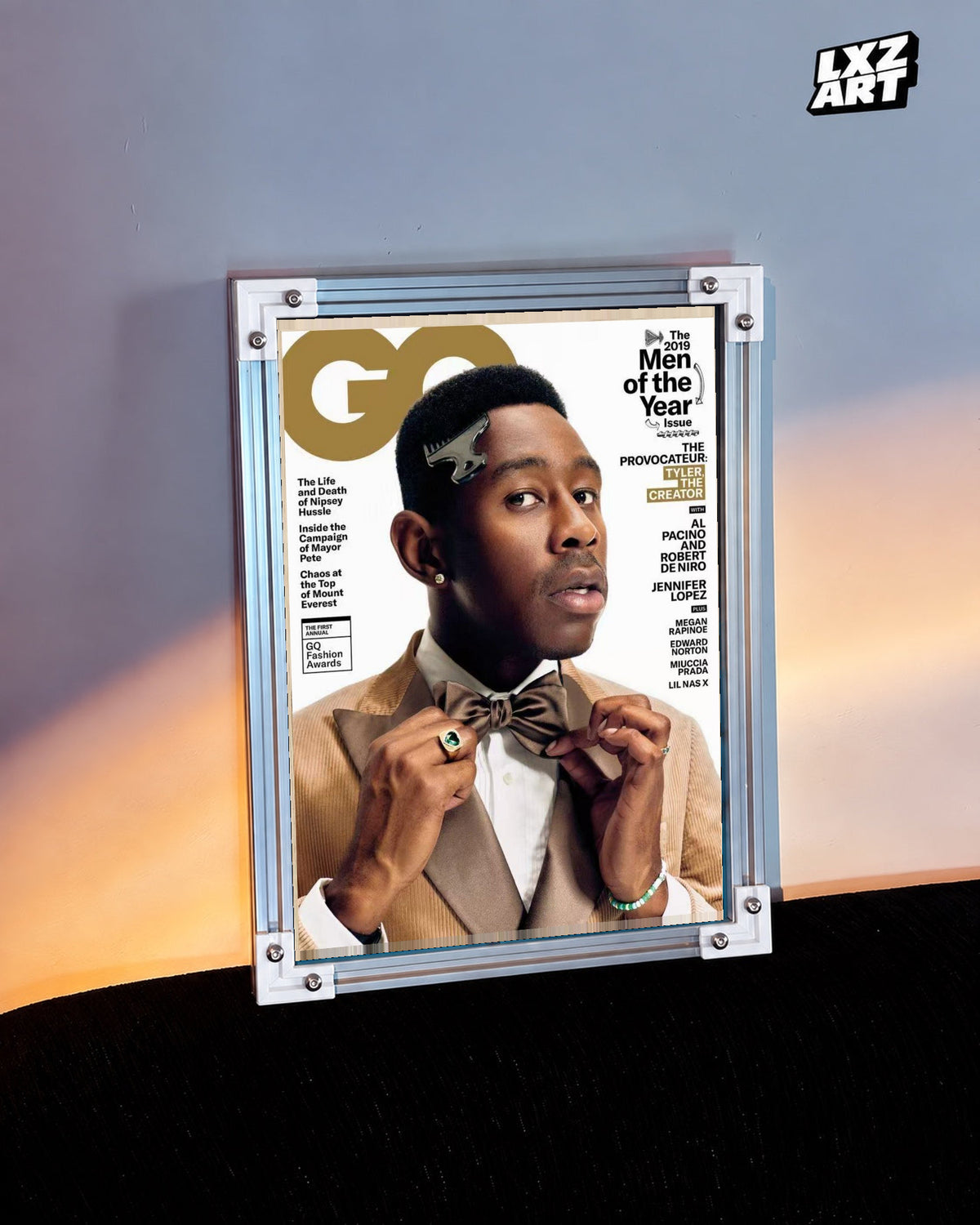 Tyler, The Creator Fashion Portrait Poster in white-corner frame beside warm-lit wall. Frame shown for display only.