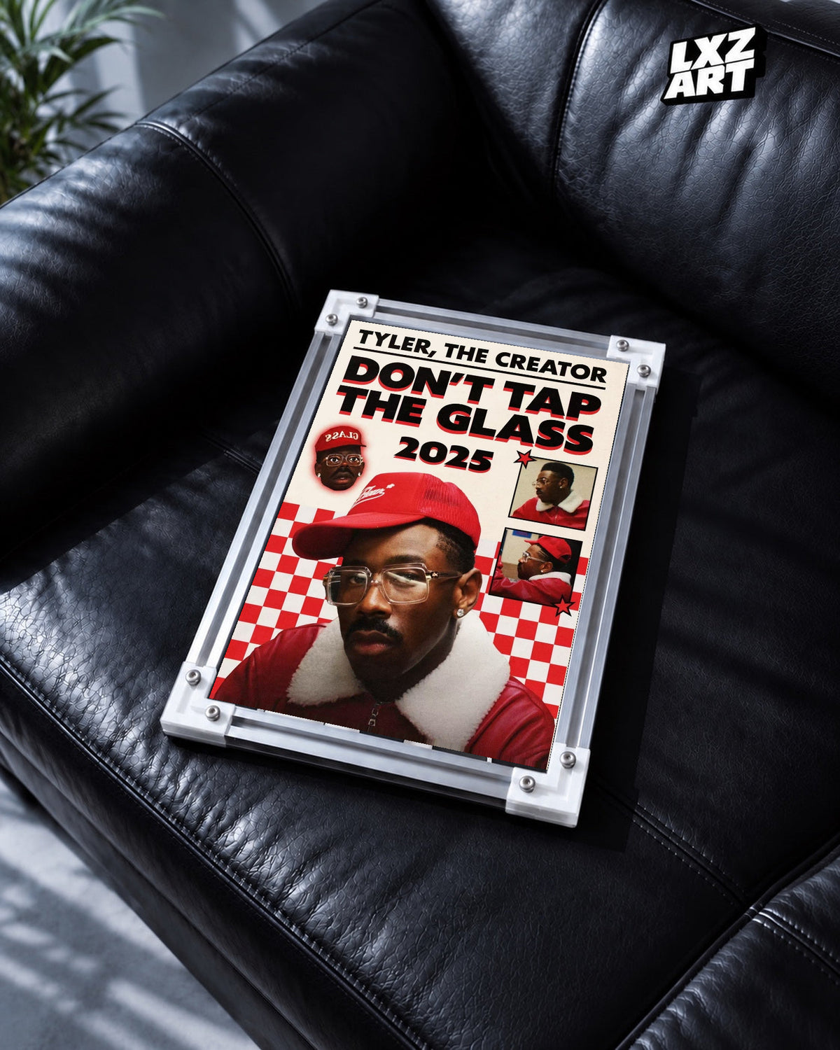 Tyler, The Creator Don't Tap The Glass Album Poster in white-corner frame on black leather sofa. Frame shown for display only.
