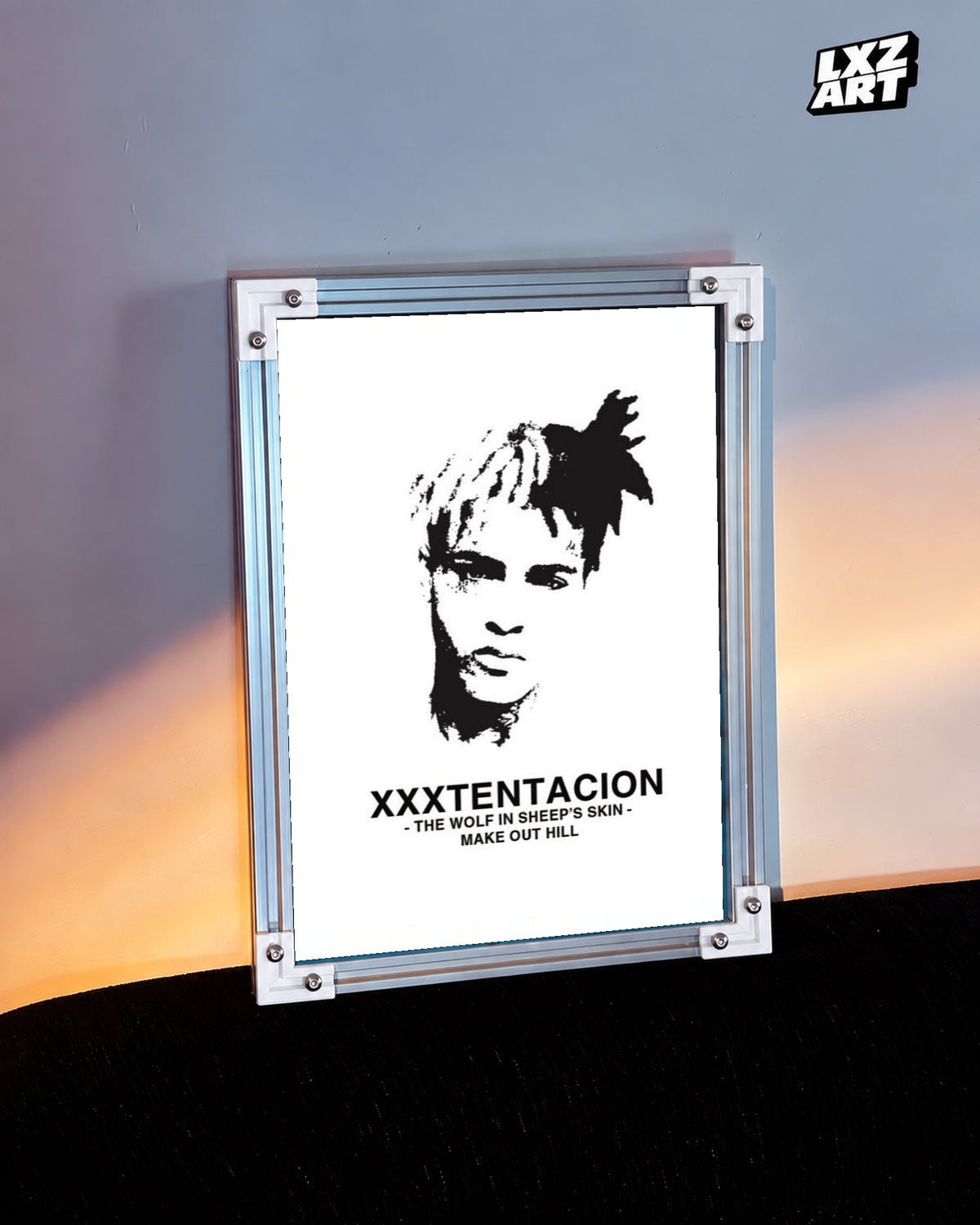 XXXTentacion Make Out Hill Minimal Portrait Poster in white-corner frame beside warm-lit wall. Frame shown for display only.
