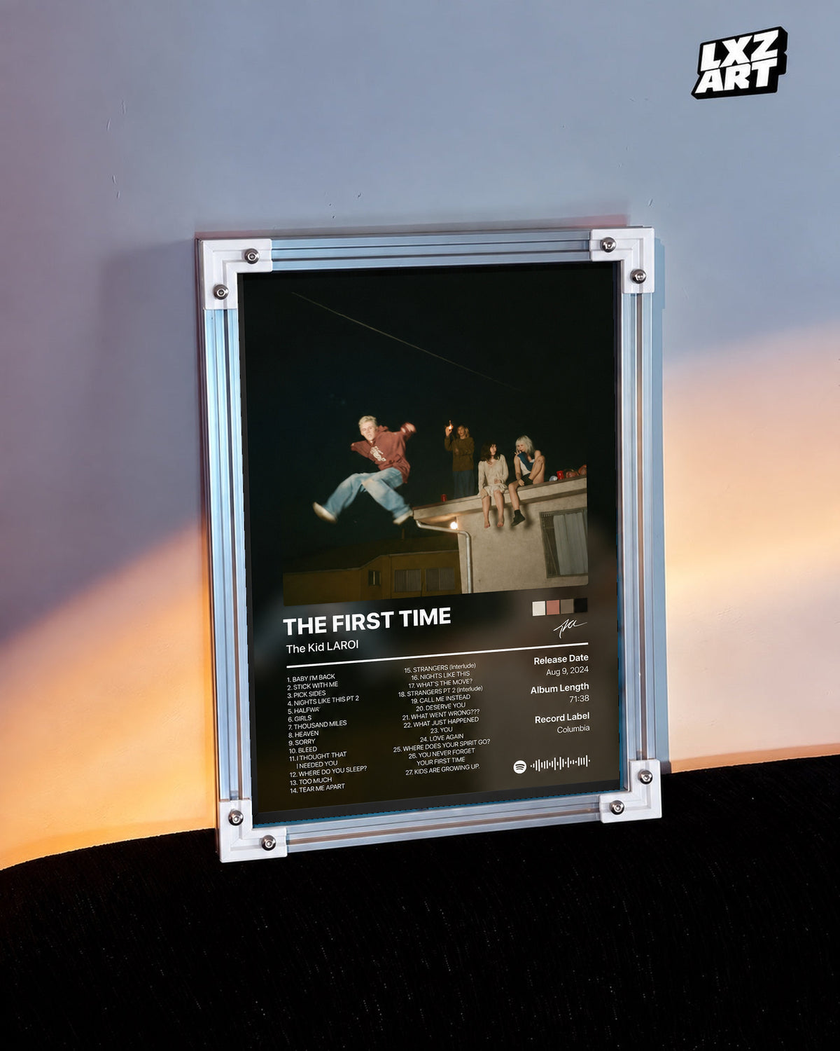 The Kid LAROI The First Time Rooftop Tracklist Poster in white-corner frame on warm-lit wall. Frame shown for display only.