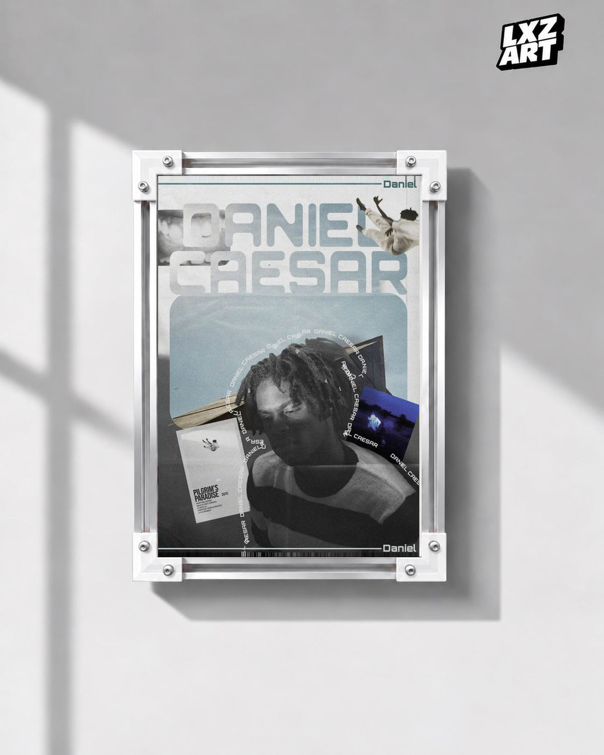 Daniel Caesar Blue Album Collage Poster in white-corner frame on gray wall. Frame shown for display only.