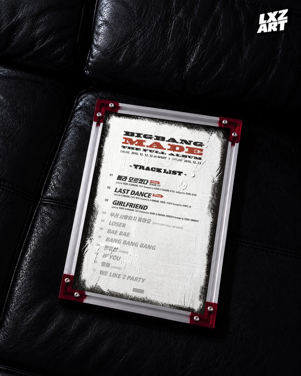 BIGBANG MADE Full Album Tracklist Poster displayed on a black leather sofa in a red-corner frame; unframed print, frame not included