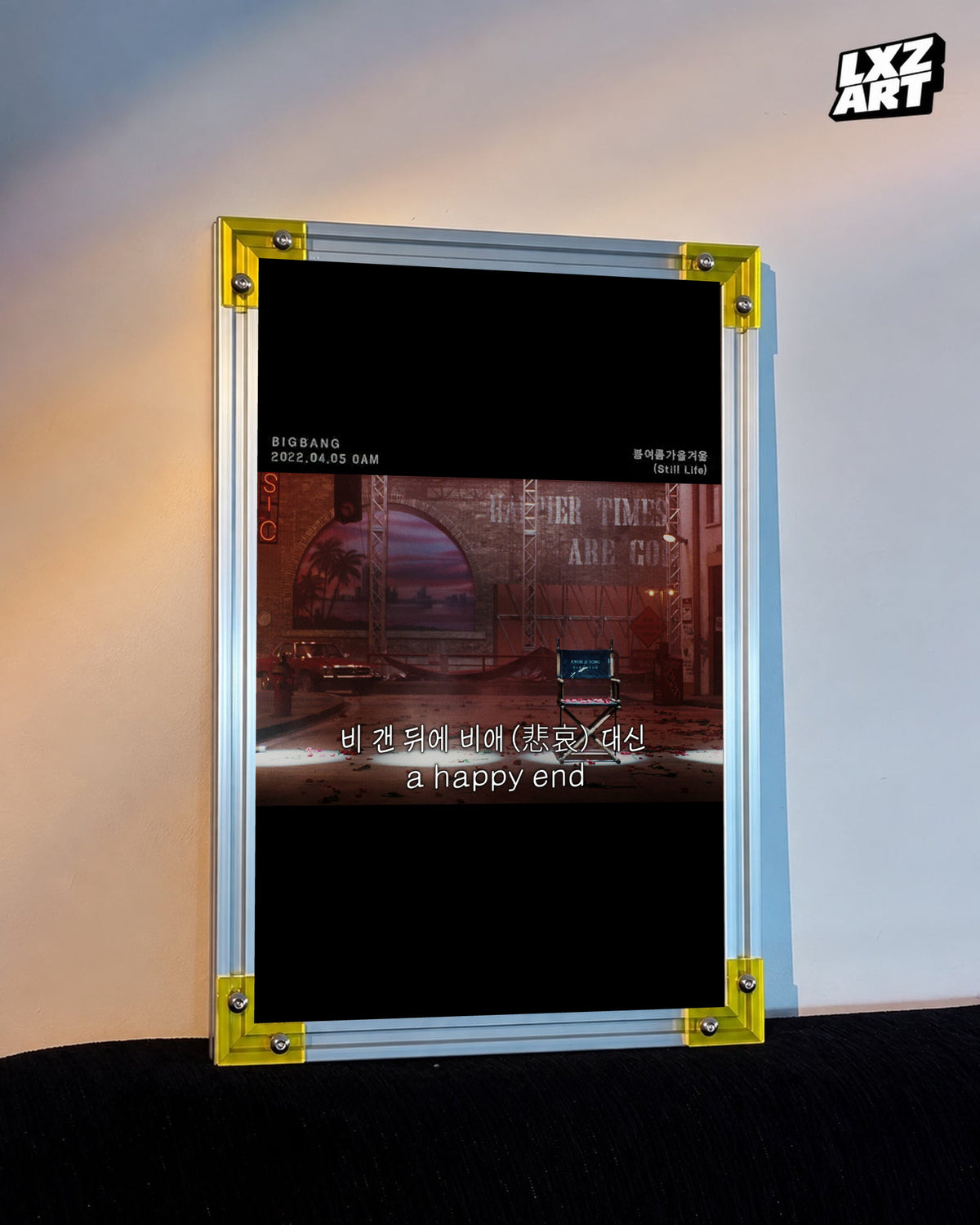 BIGBANG Still Life Red Stage Lyric Poster displayed against a warm wall in a yellow-corner frame; unframed print, frame not included