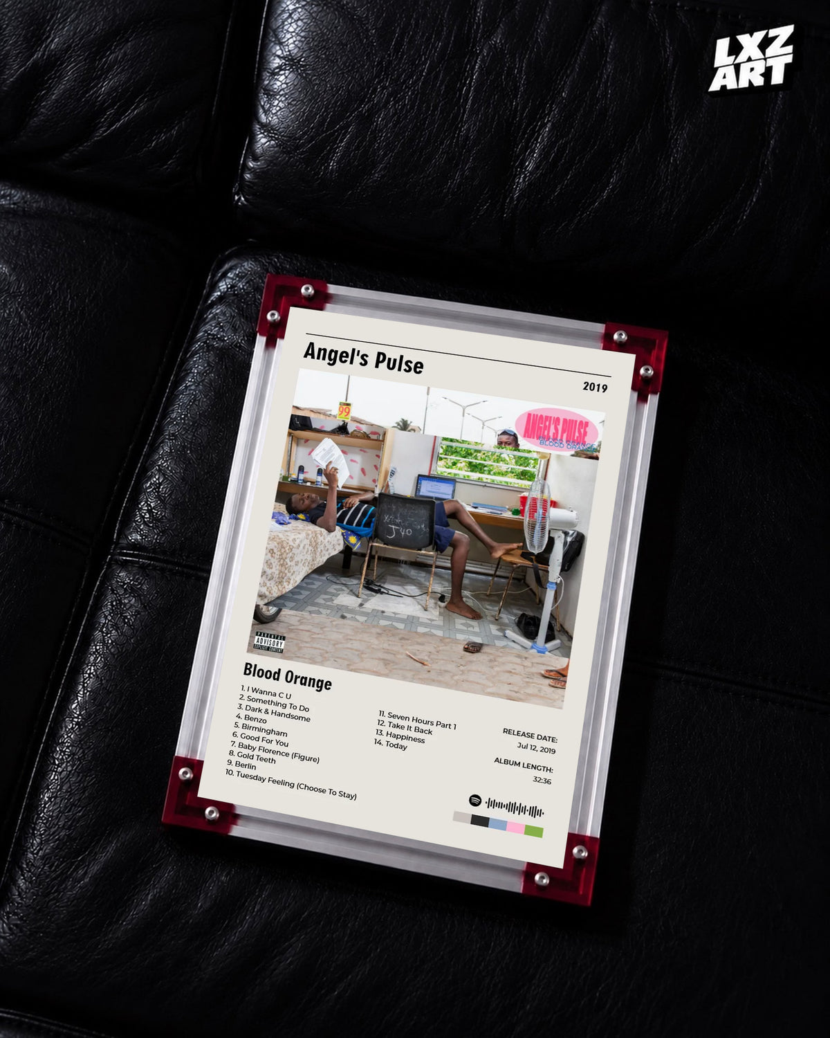 Blood Orange Angel's Pulse numbered tracklist poster displayed on a black leather sofa in the red-corner frame; unframed print, frame not included