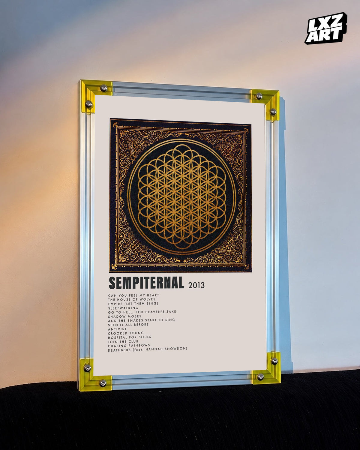 Bring Me The Horizon Sempiternal gold tracklist poster displayed against a warm wall in a yellow-corner frame; unframed print, frame not included