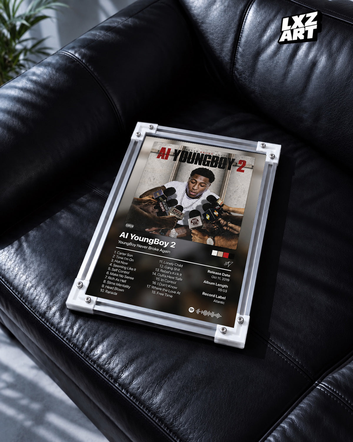 YoungBoy Never Broke Again AI YoungBoy 2 Tracklist Poster | Unframed Bedroom Wall Art — black leather sofa display; unframed print, frame not included