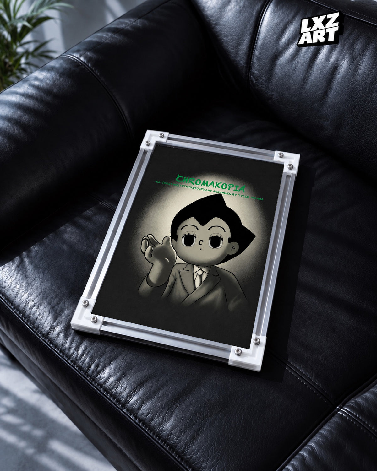 Tyler, The Creator CHROMAKOPIA × Astro Boy Poster | Unframed Wall Art — black leather sofa display; unframed print, frame not included