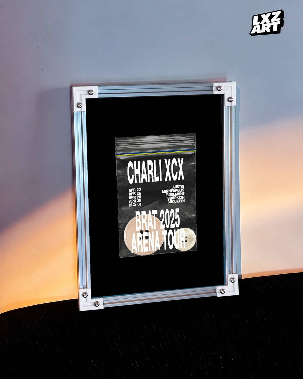 Charli xcx Brat 2025 US Tour Disc Graphic unframed poster shown in the warm-lit wall display.