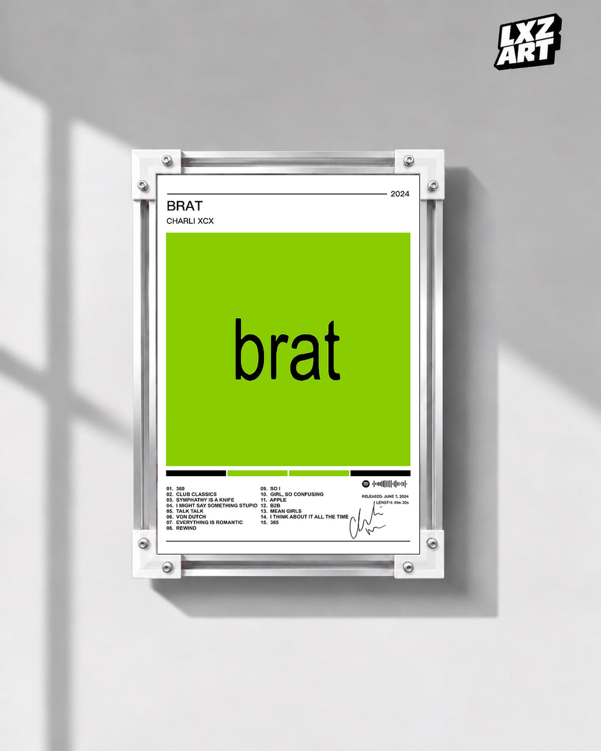 Charli xcx Brat White Tracklist unframed poster shown in the gray-wall frame display.