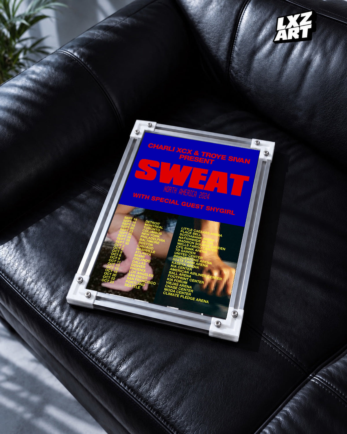 Charli xcx Sweat 2024 Blue and Red Tour unframed poster shown in the black leather sofa display.