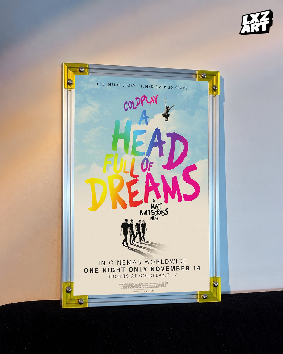 Coldplay A Head Full of Dreams Documentary Poster displayed against a warm wall in a yellow-corner frame; unframed print, frame not included