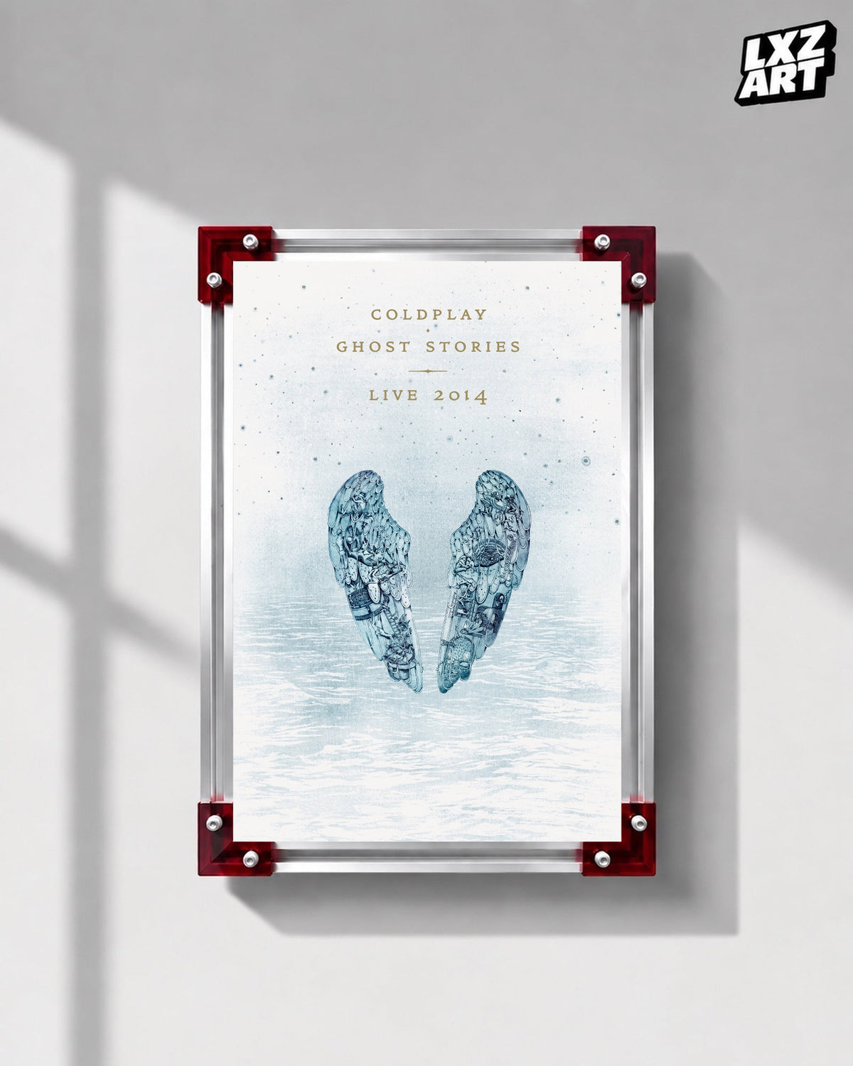 Coldplay Ghost Stories Live 2014 Poster displayed on a gray wall in a red-corner frame; unframed print, frame not included