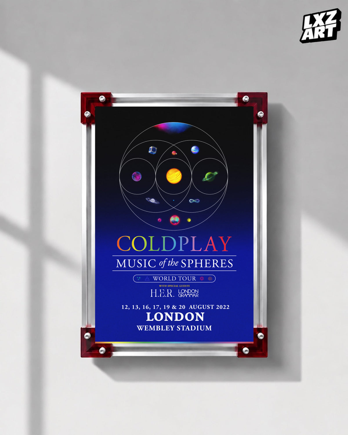 Coldplay Music of the Spheres London 2022 Tour Poster displayed on a gray wall in a red-corner frame; unframed print, frame not included