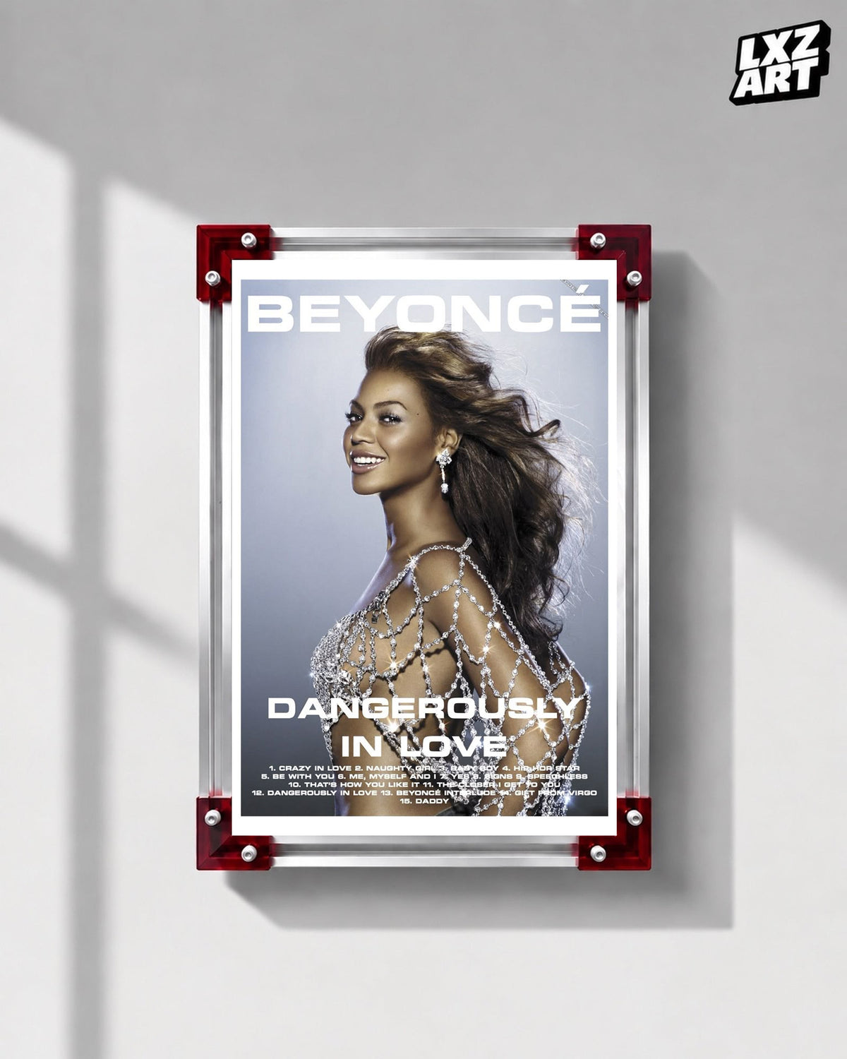 Beyoncé Dangerously in Love tracklist poster displayed on a gray wall in a red corner frame; unframed print, frame not included