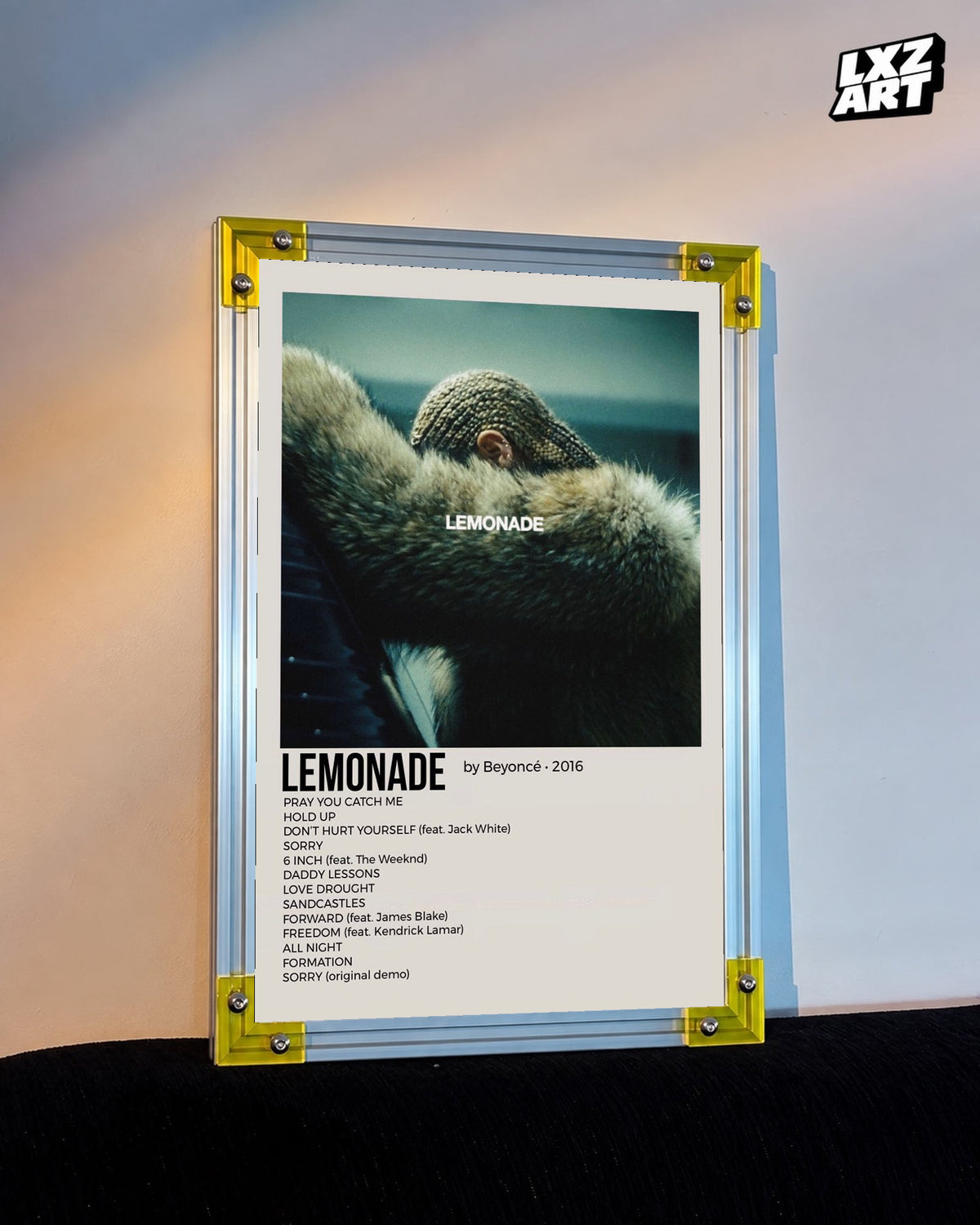 Beyoncé Lemonade tracklist poster displayed against a warm wall in a yellow corner frame; unframed print, frame not included