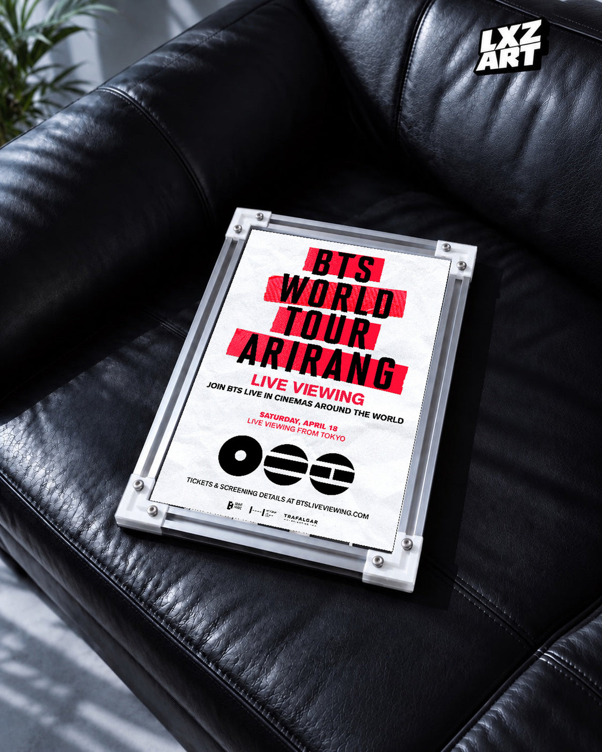 BTS World Tour ARIRANG in Japan Live Viewing poster in the LXZART black leather sofa display. Unframed print; frame shown for display only.
