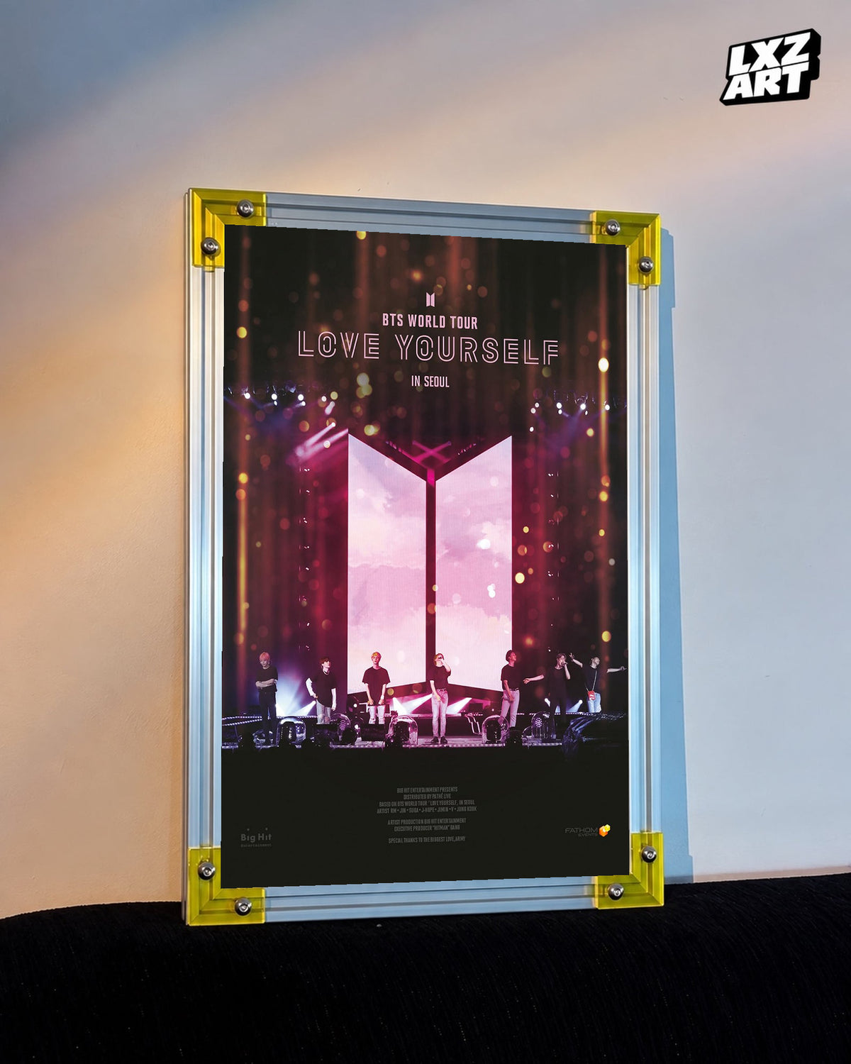BTS World Tour Love Yourself in Seoul concert film poster displayed against a warm wall in a yellow-corner frame; unframed print, frame not included