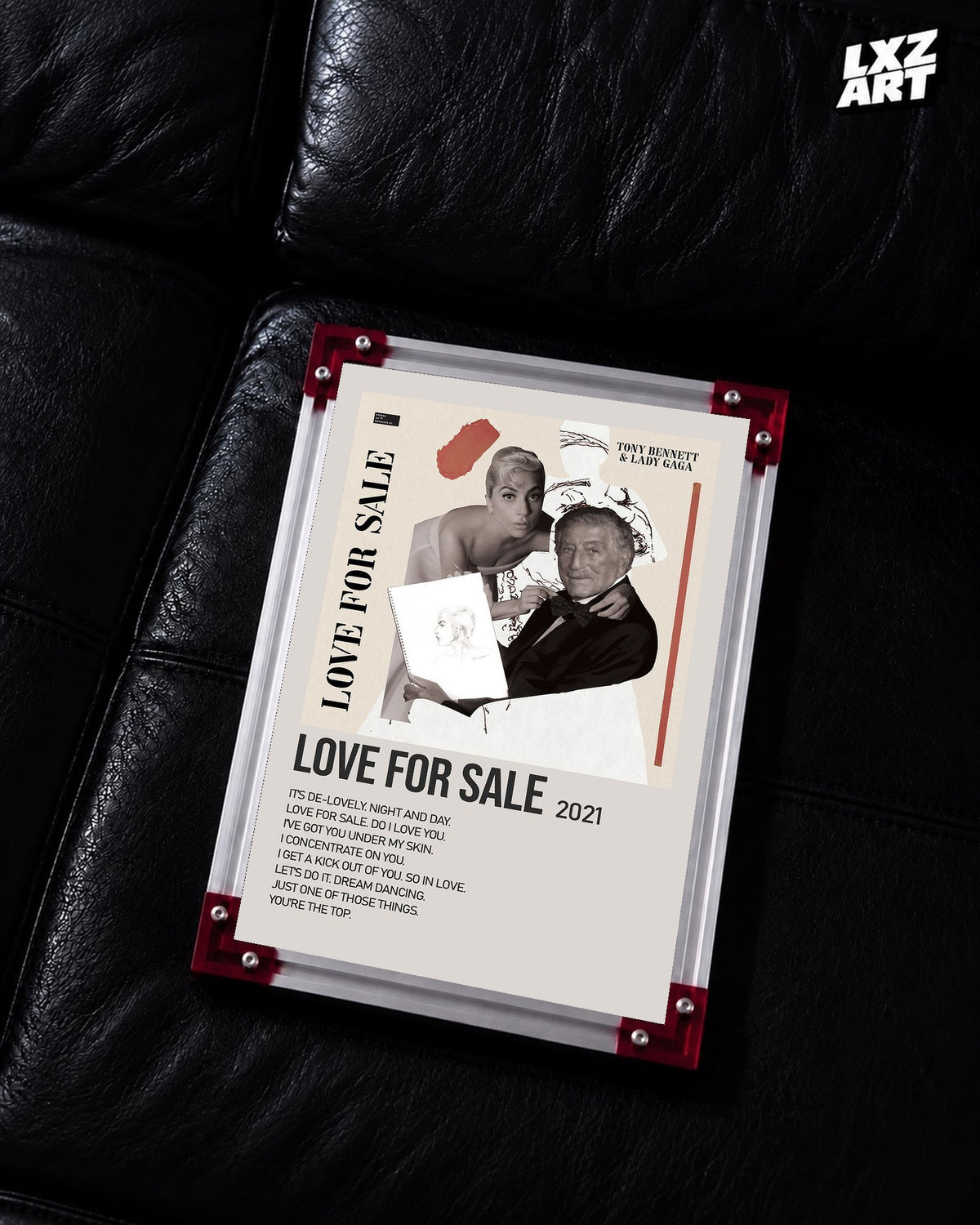 Lady Gaga & Tony Bennett Love for Sale tracklist poster displayed on a black leather sofa in a red corner frame; unframed print, frame not included