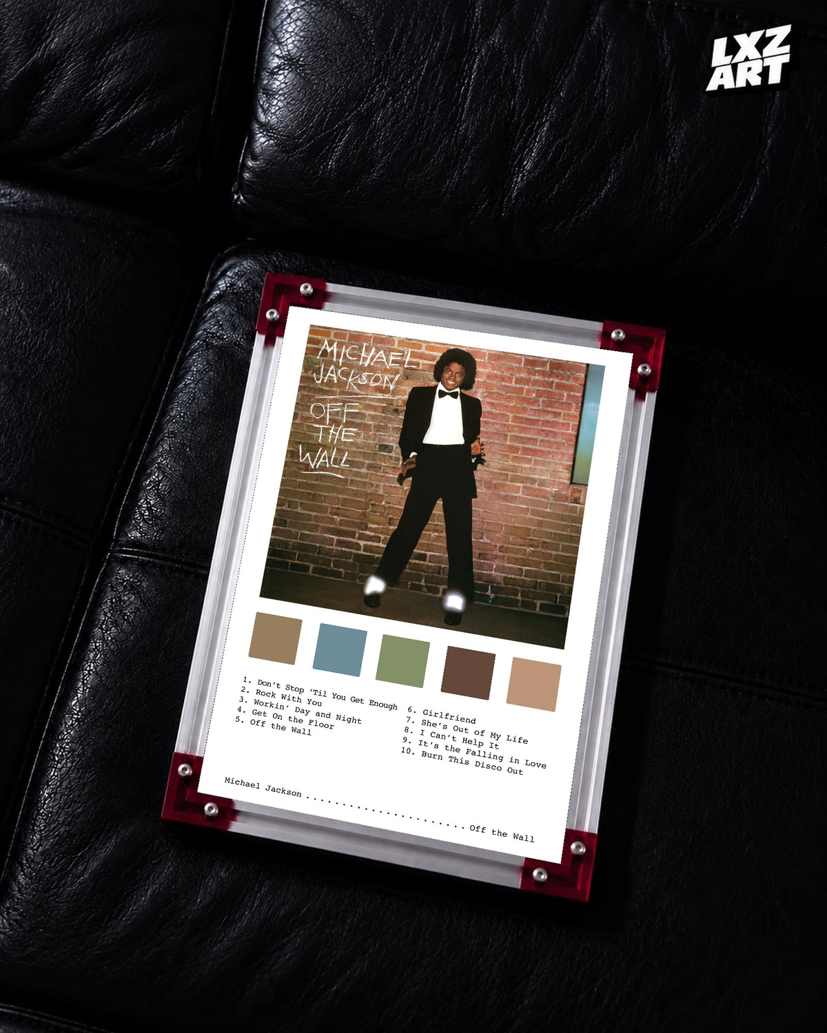 Michael Jackson Off the Wall Full-Length Brick Wall tracklist poster displayed on a black leather sofa in a red corner frame; unframed print, frame not included