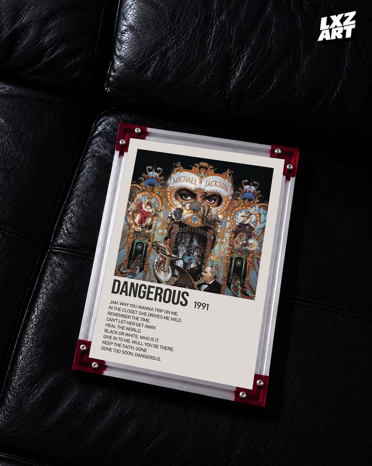 Michael Jackson Dangerous tracklist poster displayed on a black leather sofa in a red corner frame; unframed print, frame not included