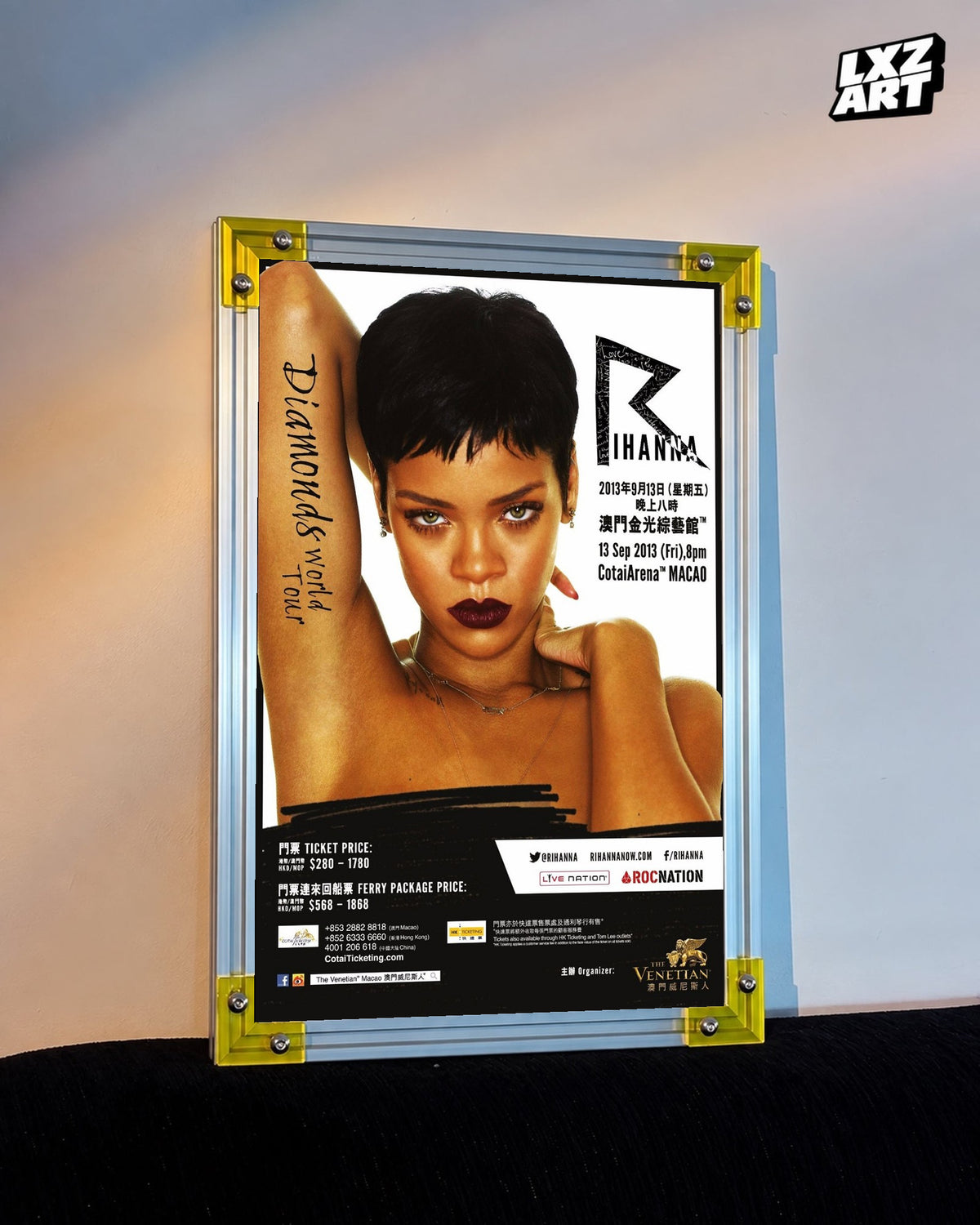 Rihanna Diamonds World Tour Macao concert poster displayed against a warm wall in a yellow corner frame; unframed print, frame not included