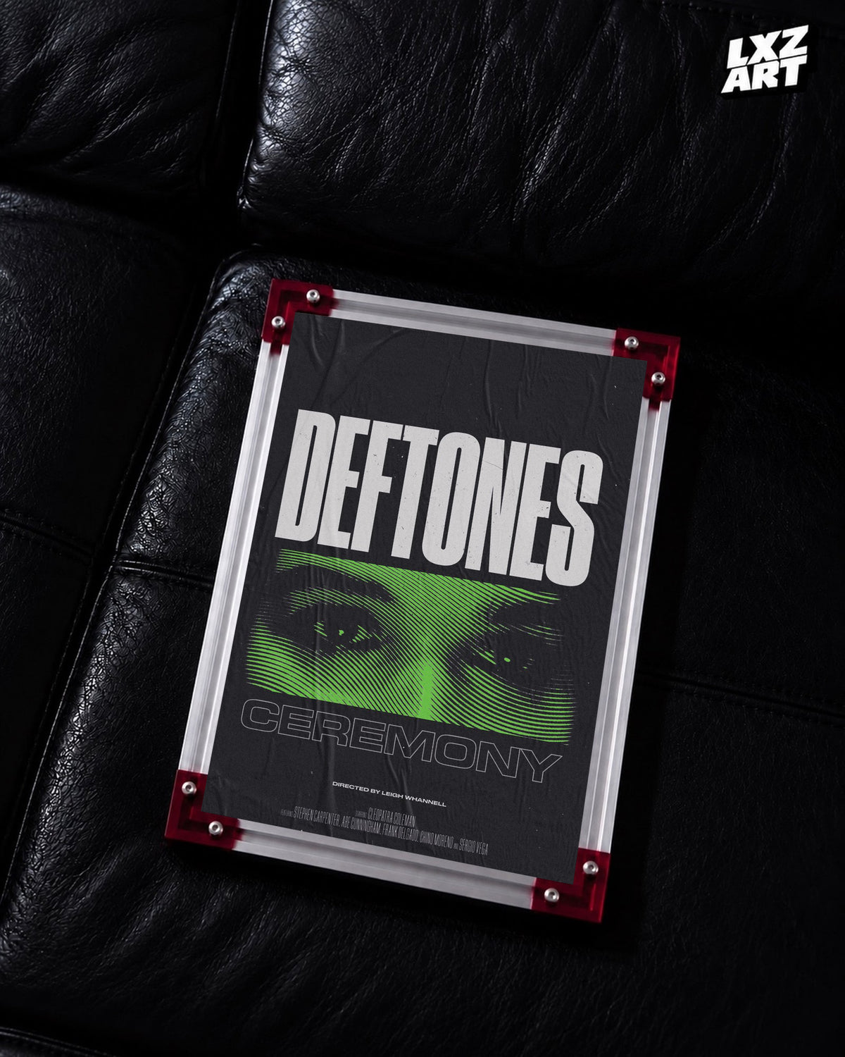 Deftones Ceremony Green Eyes Music Video Poster displayed on a black leather sofa in a red-corner frame; unframed print, frame not included