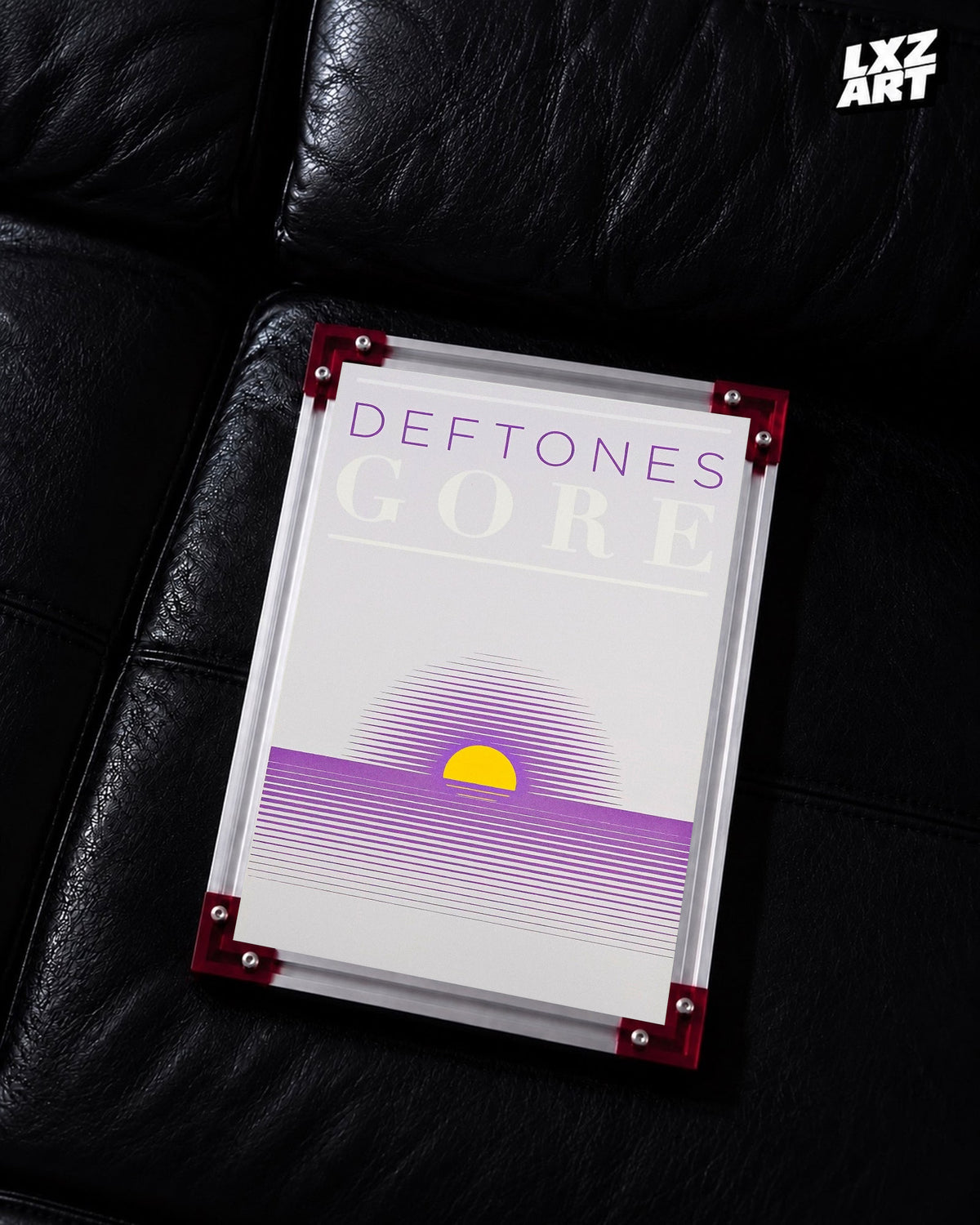 Deftones Gore Purple Sunset Album Poster displayed on a black leather sofa in a red-corner frame; unframed print, frame not included