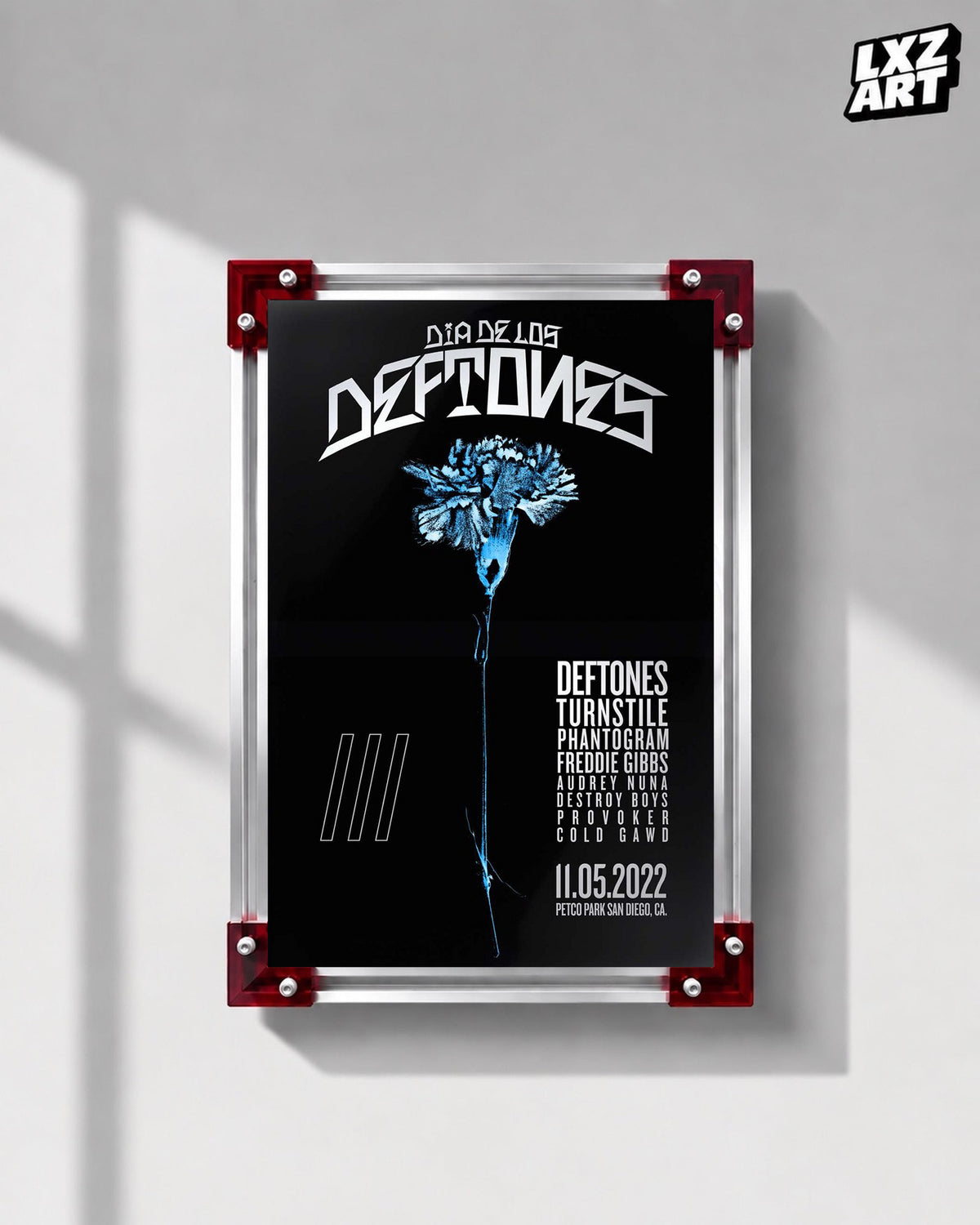 Deftones Dia de los Deftones 2022 Blue Flower Festival Poster displayed on a gray wall in a red-corner frame; unframed print, frame not included