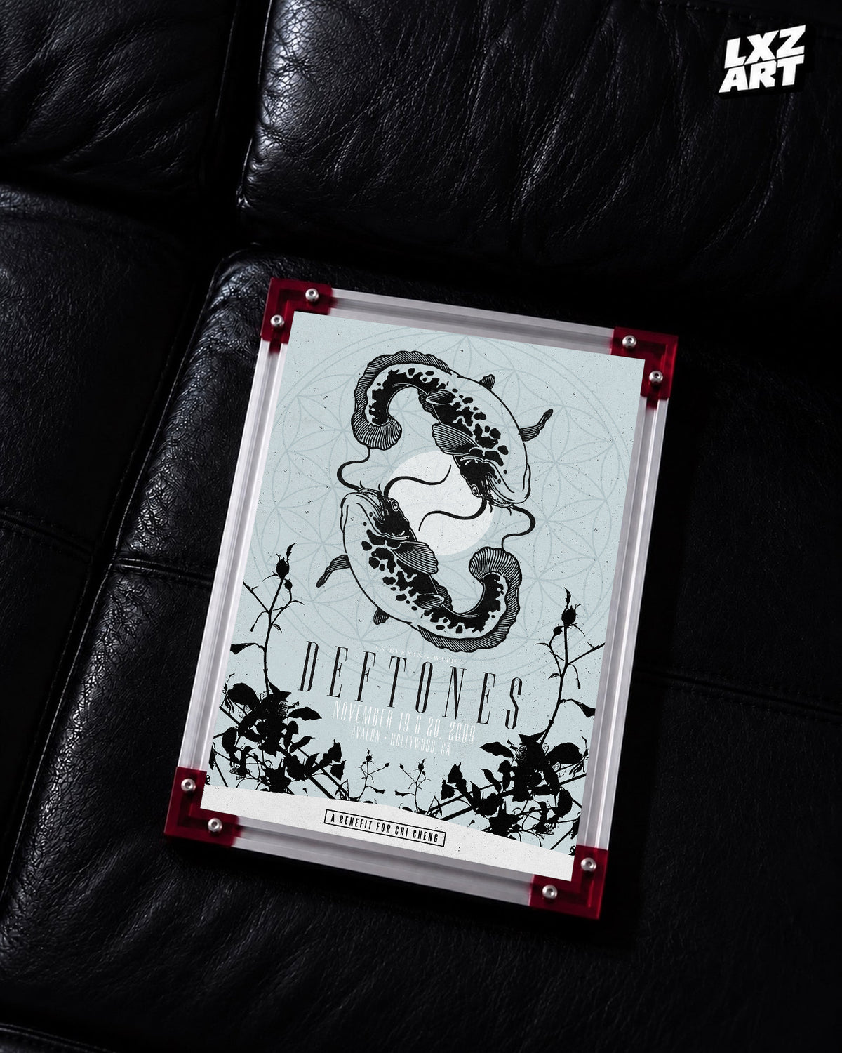 Deftones A Benefit for Chi Cheng 2009 Koi Concert Poster displayed on a black leather sofa in a red-corner frame; unframed print, frame not included