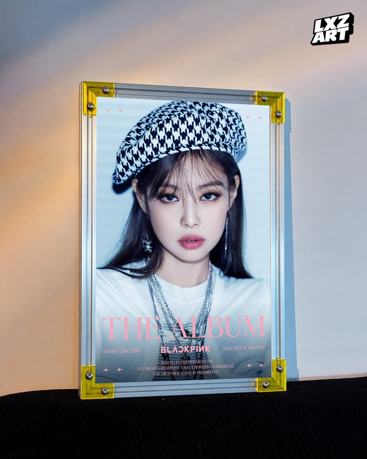 JENNIE BLACKPINK The Album blue beret teaser poster displayed against a warm wall in a yellow-corner frame; unframed print, frame not included