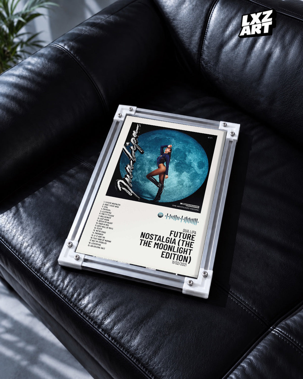 Dua Lipa Future Nostalgia Moonlight Edition Tracklist Poster | Unframed Music Wall Art — black leather sofa scene; frame for display only