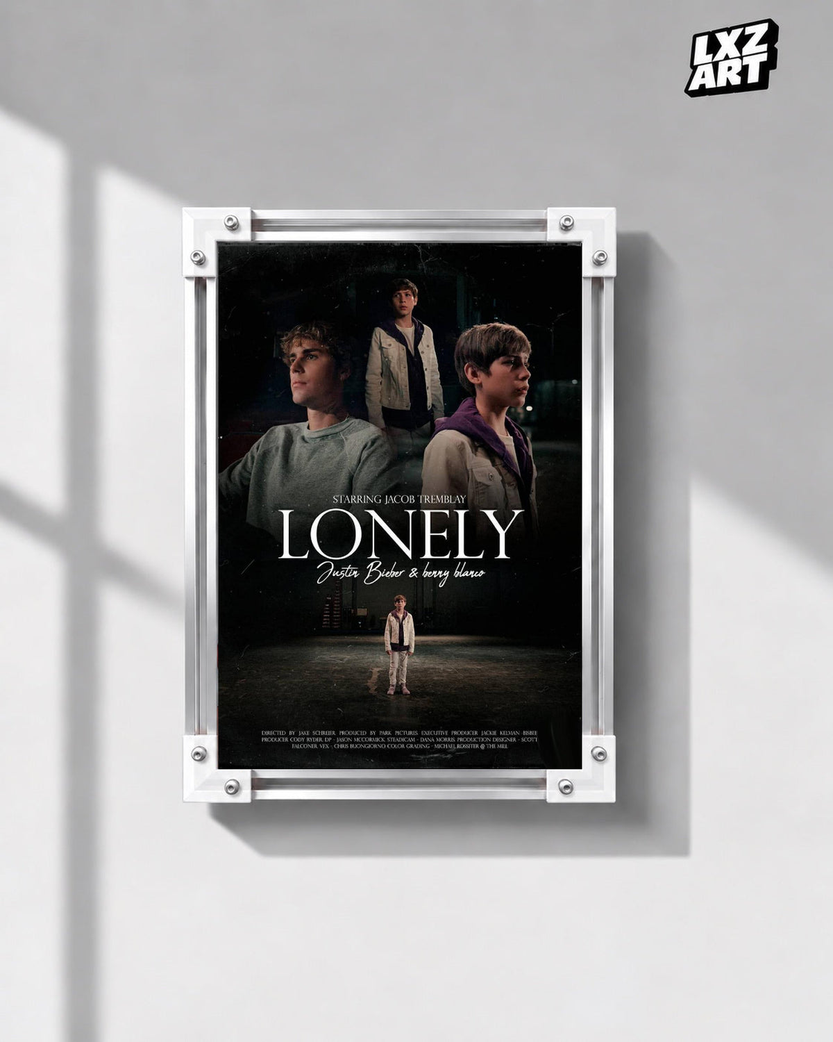 Justin Bieber & benny blanco Lonely Music Video Poster displayed in a white-corner frame on a gray wall. Frame for display only.