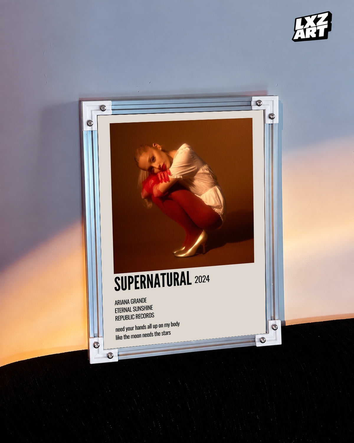 Ariana Grande Supernatural Track Poster — warm light wall; frame for display only