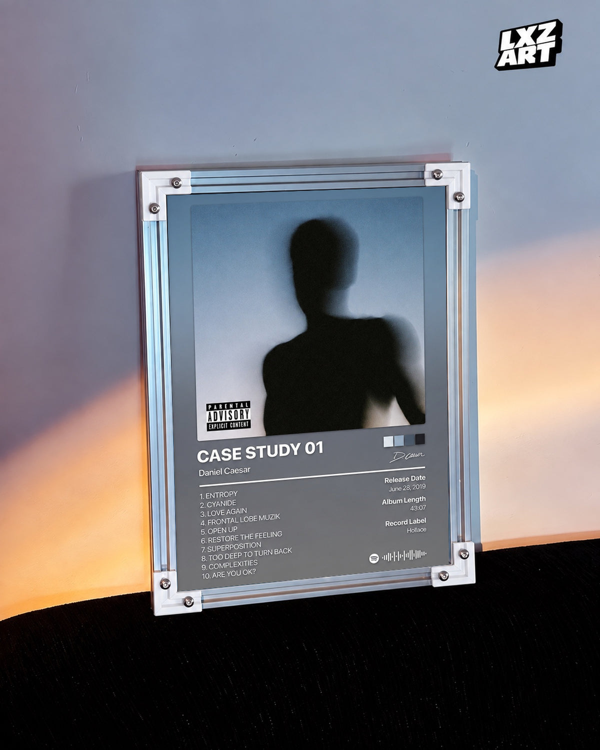 Daniel Caesar CASE STUDY 01 Tracklist Poster — warm light wall; frame for display only
