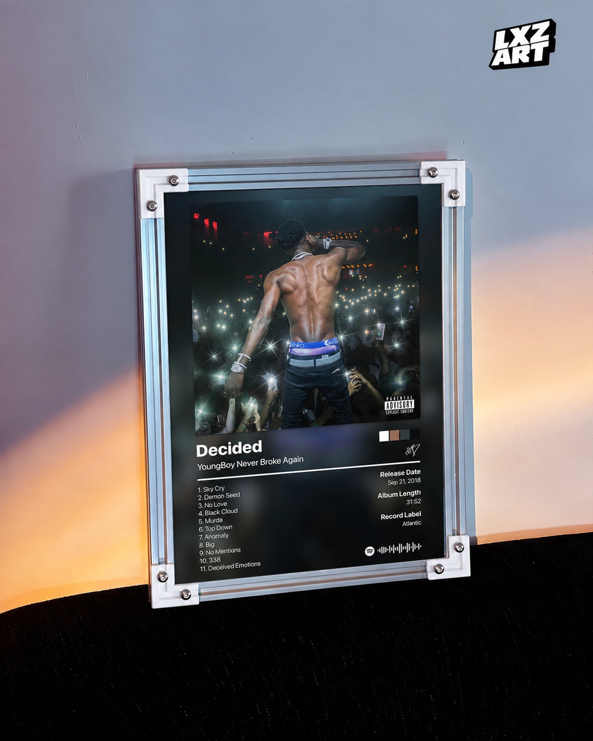 YoungBoy Never Broke Again Decided Tracklist Poster — warm light wall; frame for display only