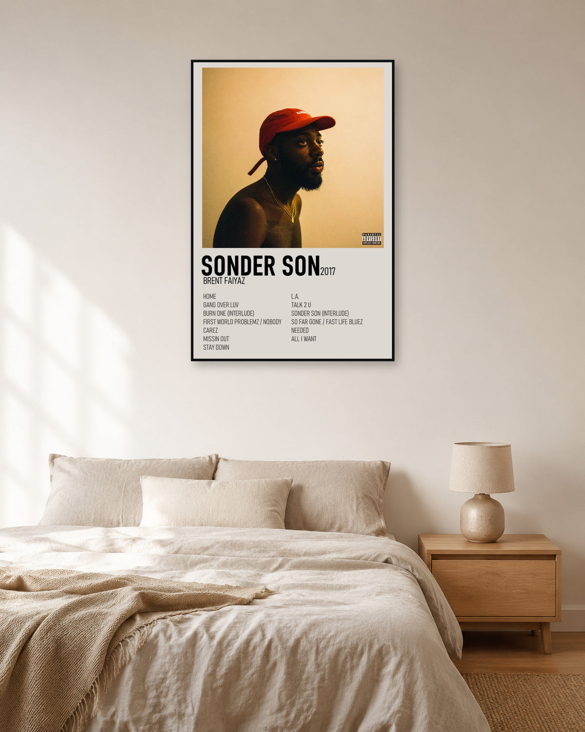 Brent Faiyaz Sonder Son Cream Two-Column Tracklist Poster — natural-light bedroom display. Print sold unframed; frame for display only.