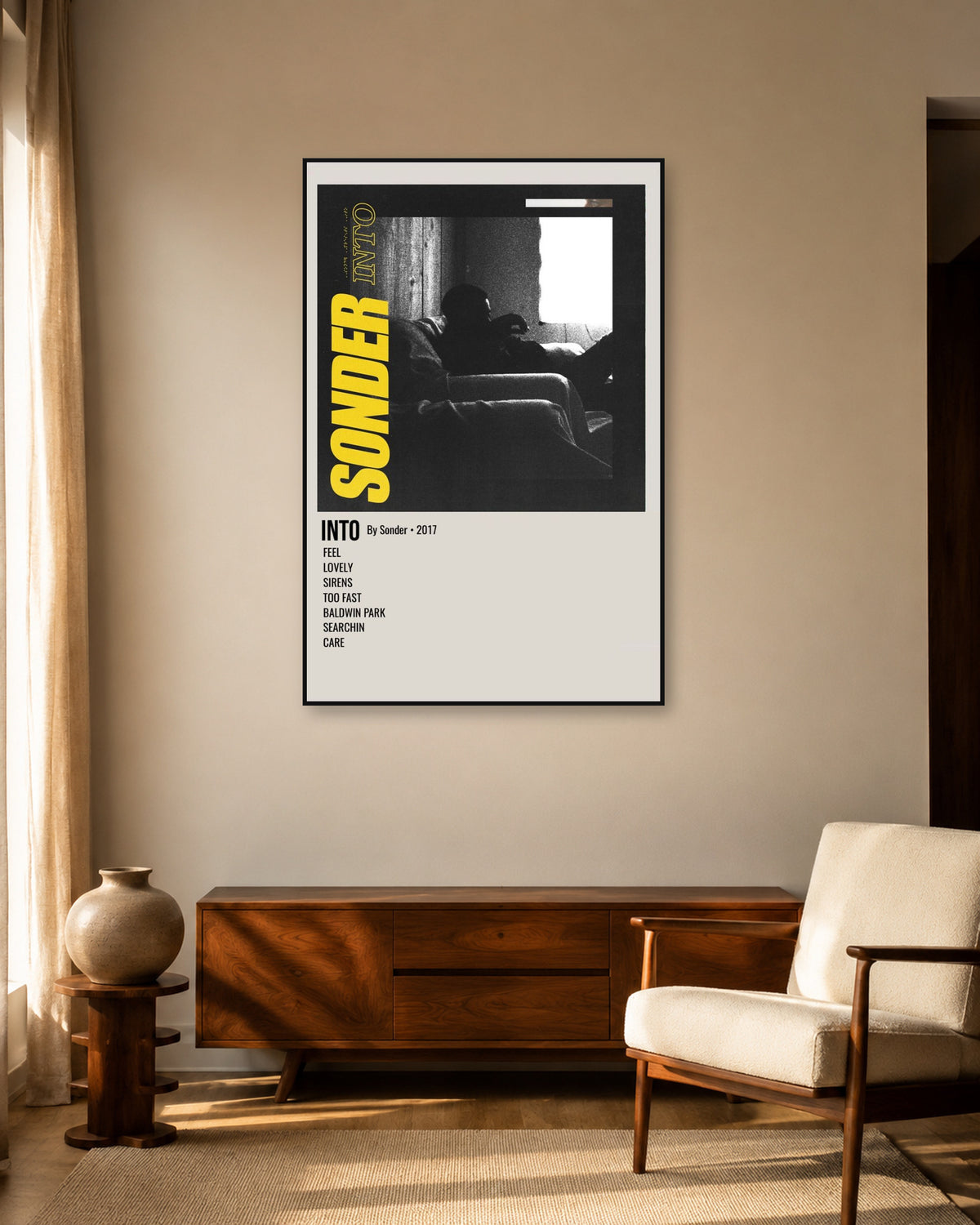 Brent Faiyaz Into Sonder Yellow Tracklist Poster — warm mid-century living room display. Print sold unframed; frame for display only.