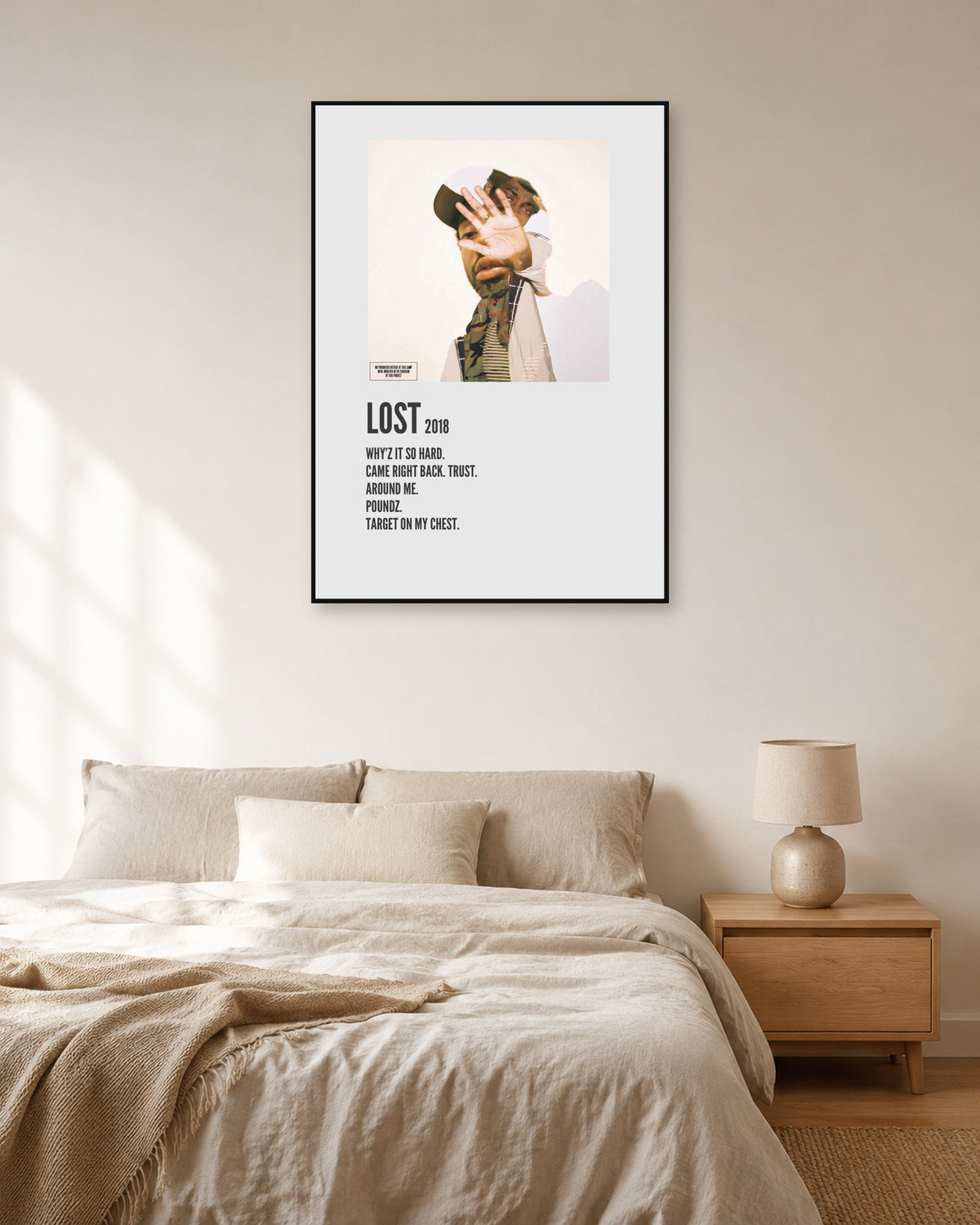 Brent Faiyaz Lost Cream Tracklist Poster — natural-light bedroom display. Print sold unframed; frame for display only.
