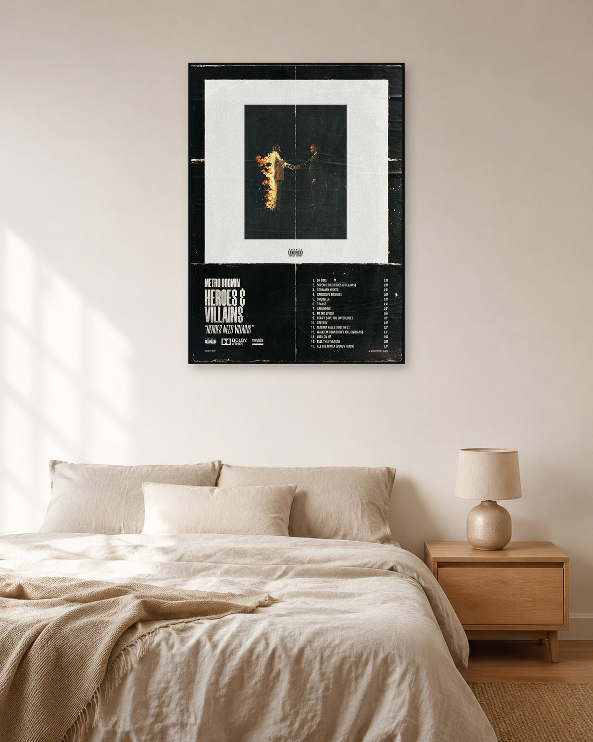 Metro Boomin Heroes & Villains Distressed Black Tracklist Poster — natural-light bedroom display. Print sold unframed; frame for display only.