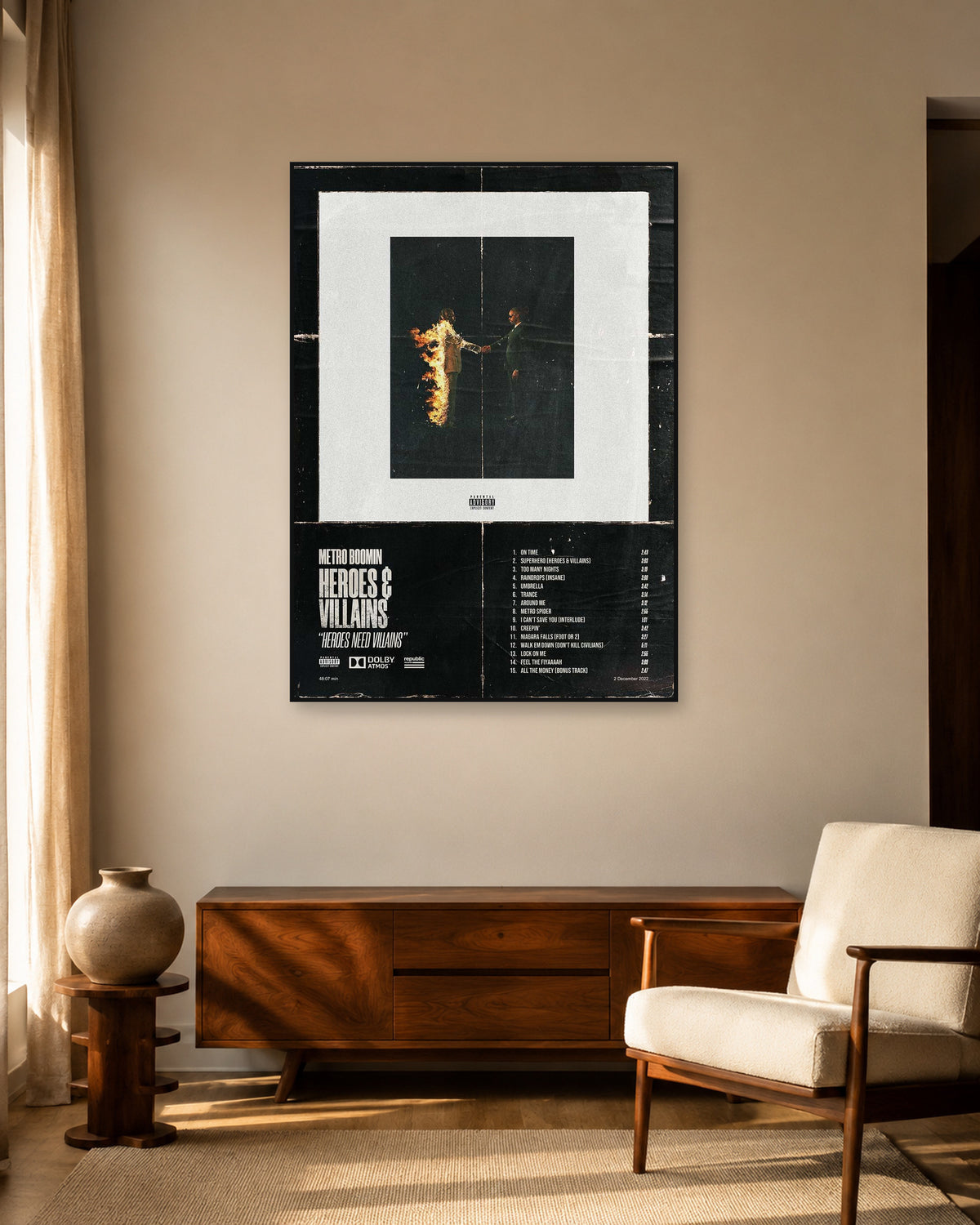 Metro Boomin Heroes & Villains Distressed Black Tracklist Poster — warm mid-century living room display. Print sold unframed; frame for display only.
